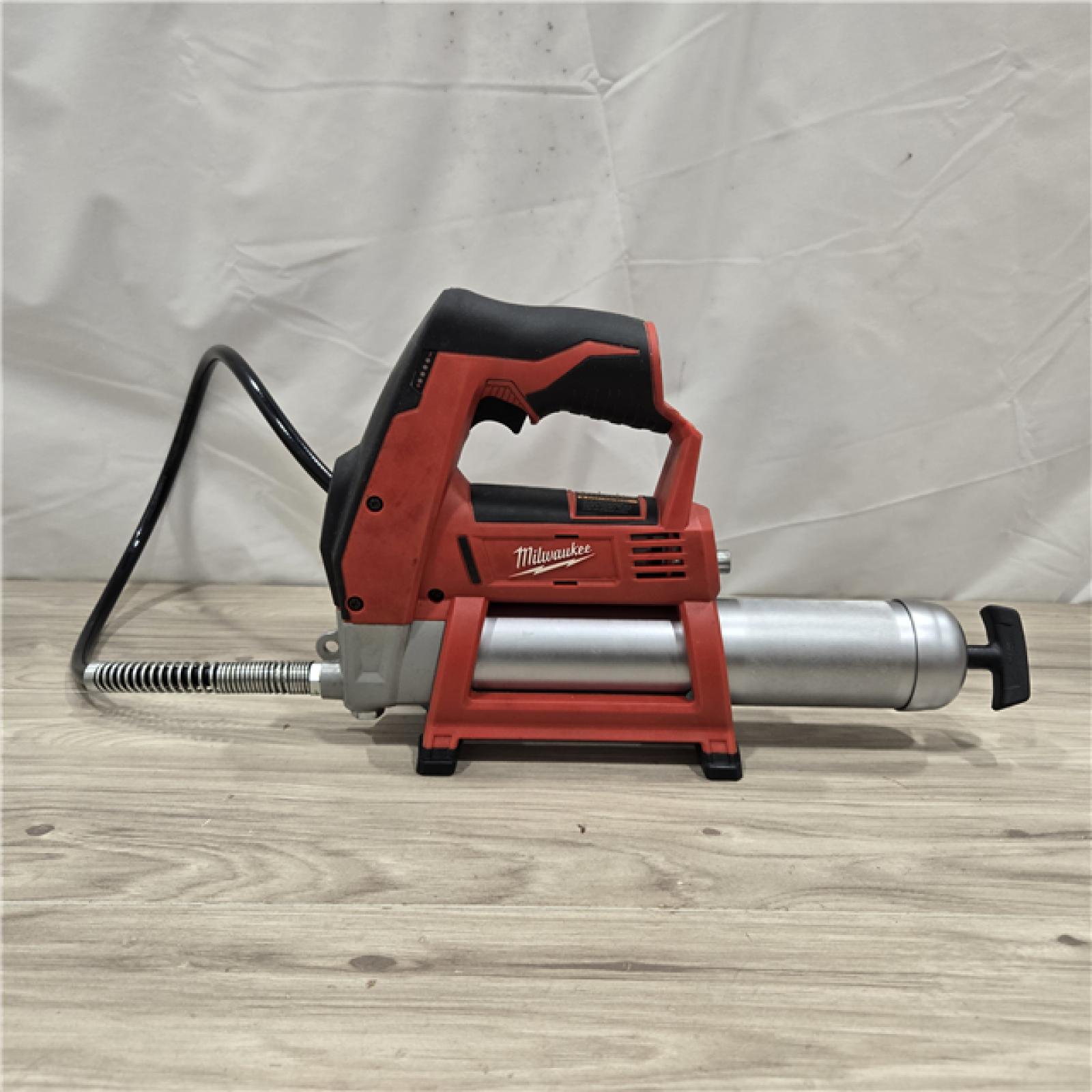 AS-IS Milwaukee M12 Cordless LITHIUM-ION Grease Gun (Tool-Only)
