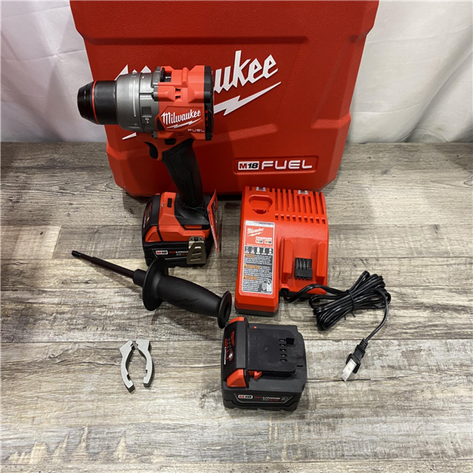 AS-IS Milwaukee FUEL 18V Lithium-Ion Brushless Cordless 1/2 in. Hammer Drill Driver Kit