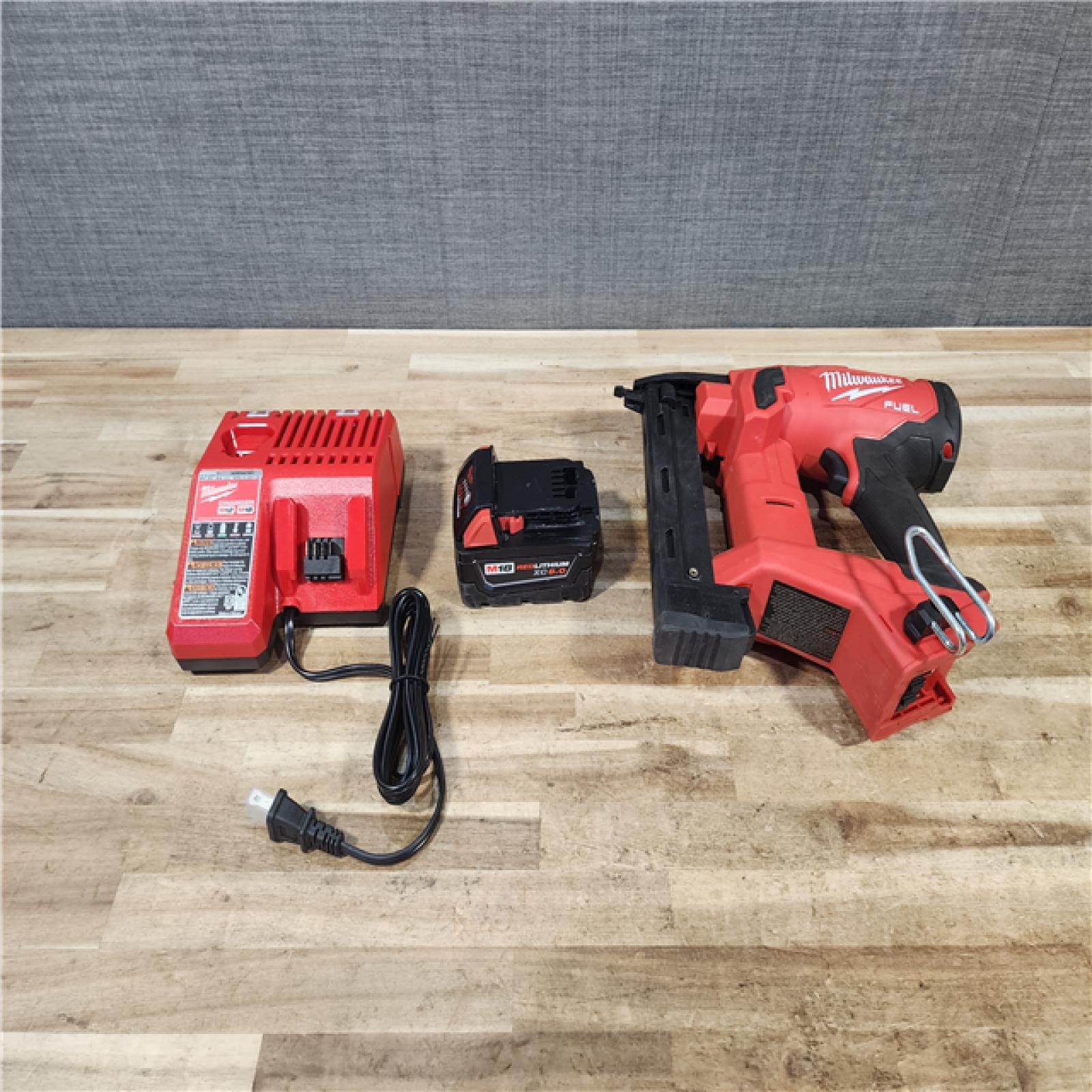 HOUSTON LOCATION - AS - IS Milwaukee FUEL 18-Volt Lithium-Ion Brushless Cordless 18-Gauge 1/4 in. Narrow Crown Stapler W/ BATTERY & CHARGER