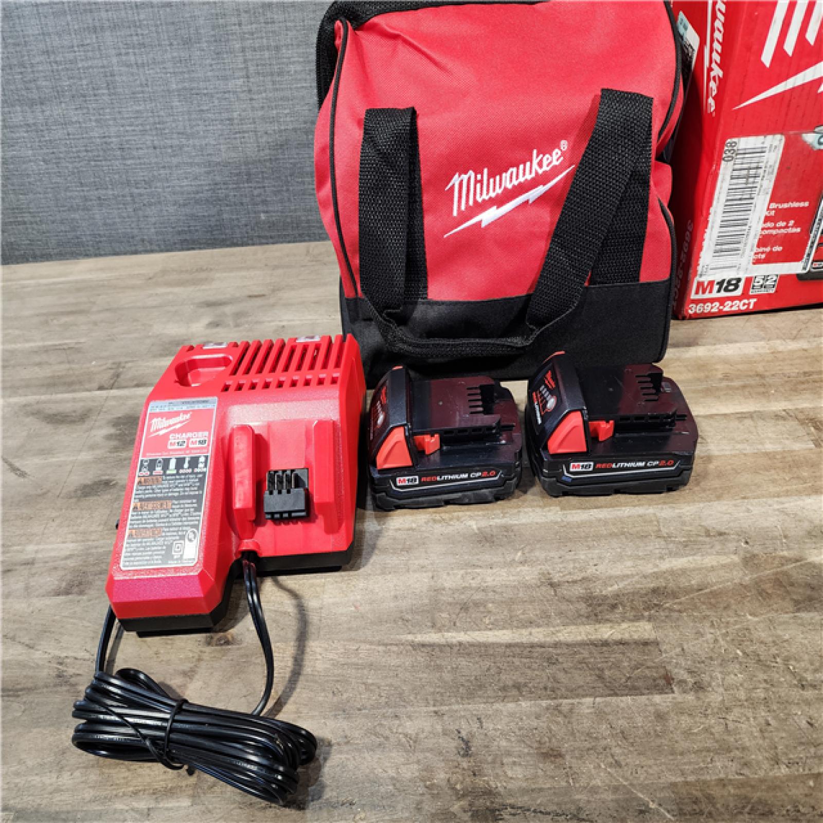HOUSTON LOCATION - AS-IS Milwaukee M18 18V Lithium-Ion Brushless Cordless Compact Drill/Impact Combo Kit (2-Tool) W/(2) 2.0 Ah Batteries, Charger & Bag