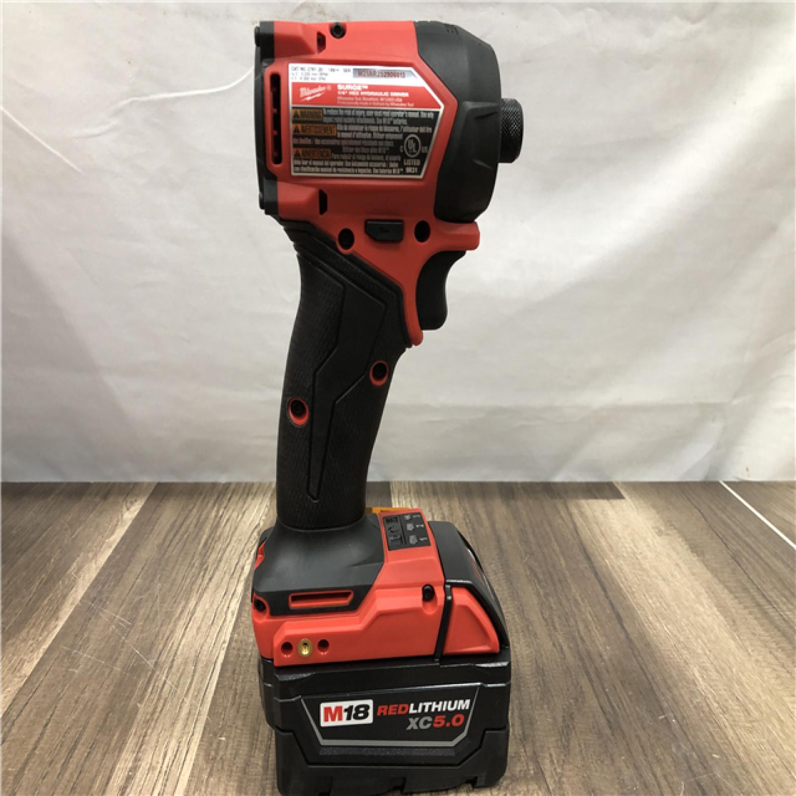 AS-IS Milwaukee FUEL SURGE 18V Lithium-Ion Brushless Cordless 1/4 in. Hex Impact Driver with (2) 5.0 Ah Battery and Charger