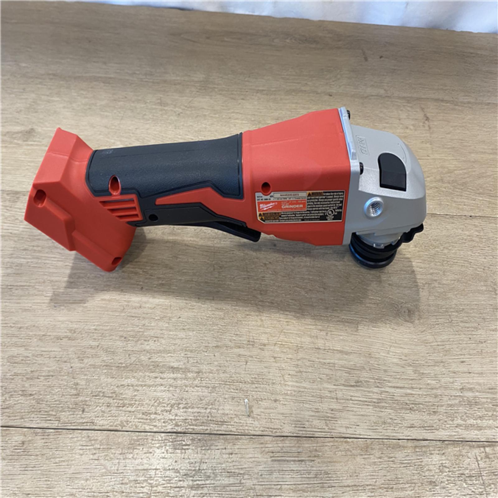 AS-IS Milwaukee 18V Lithium-Ion Brushless Cordless 4-1/2 in./5 in. Grinder w/Paddle Switch (Tool-Only)
