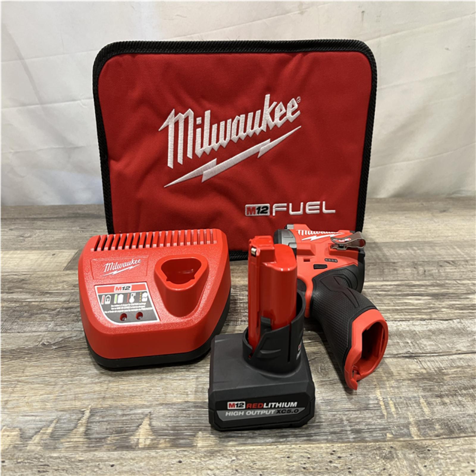 AS-IS Milwaukee FUEL 12V Li-Ion Brushless Cordless Stubby 3/8 in. Impact Wrench Kit