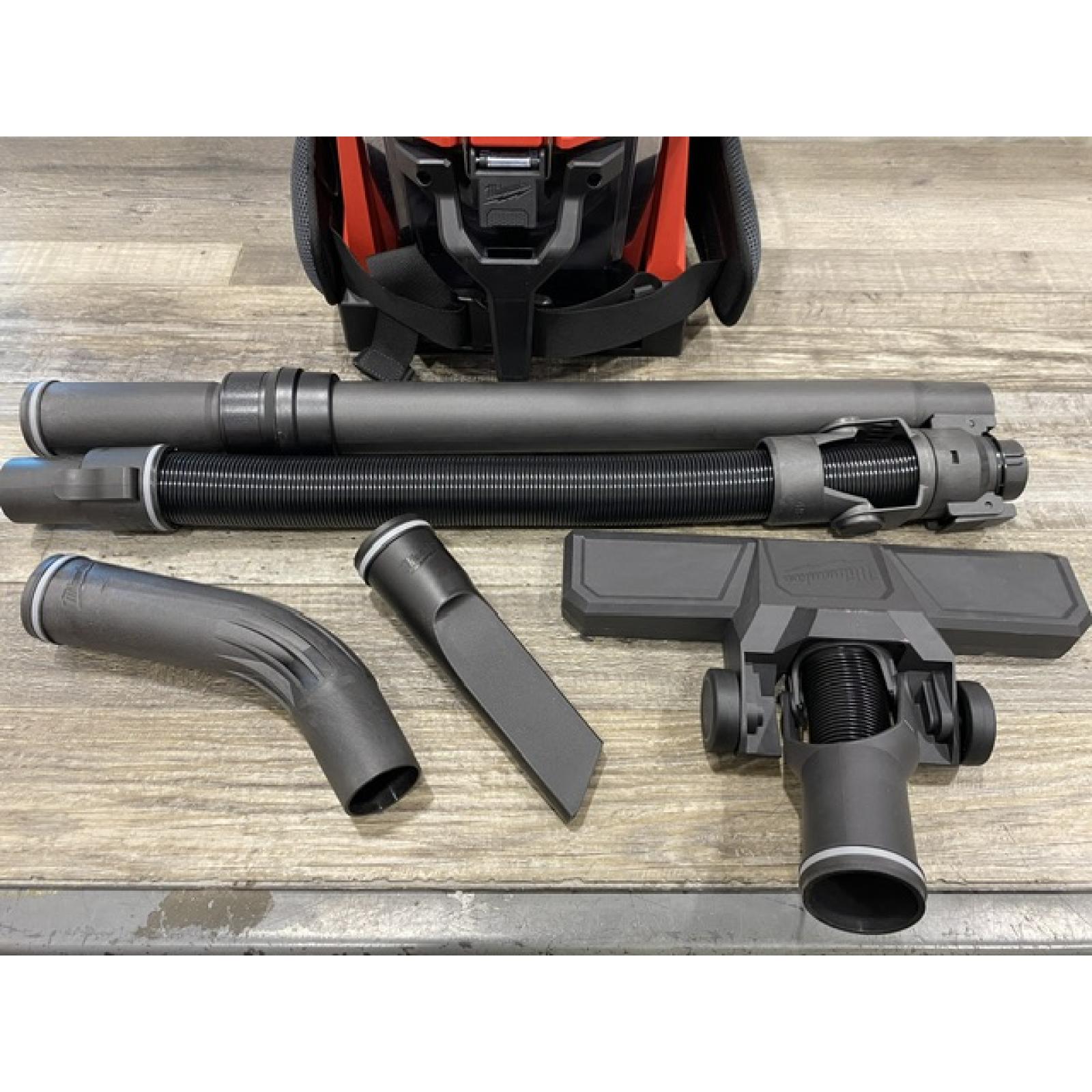 AS-IS Milwaukee FUEL 18-Volt Lithium-Ion Brushless Red HEPA Multisurface 1 Gal. Cordless 3-in-1 Backpack Vacuum (Vacuum-Only)