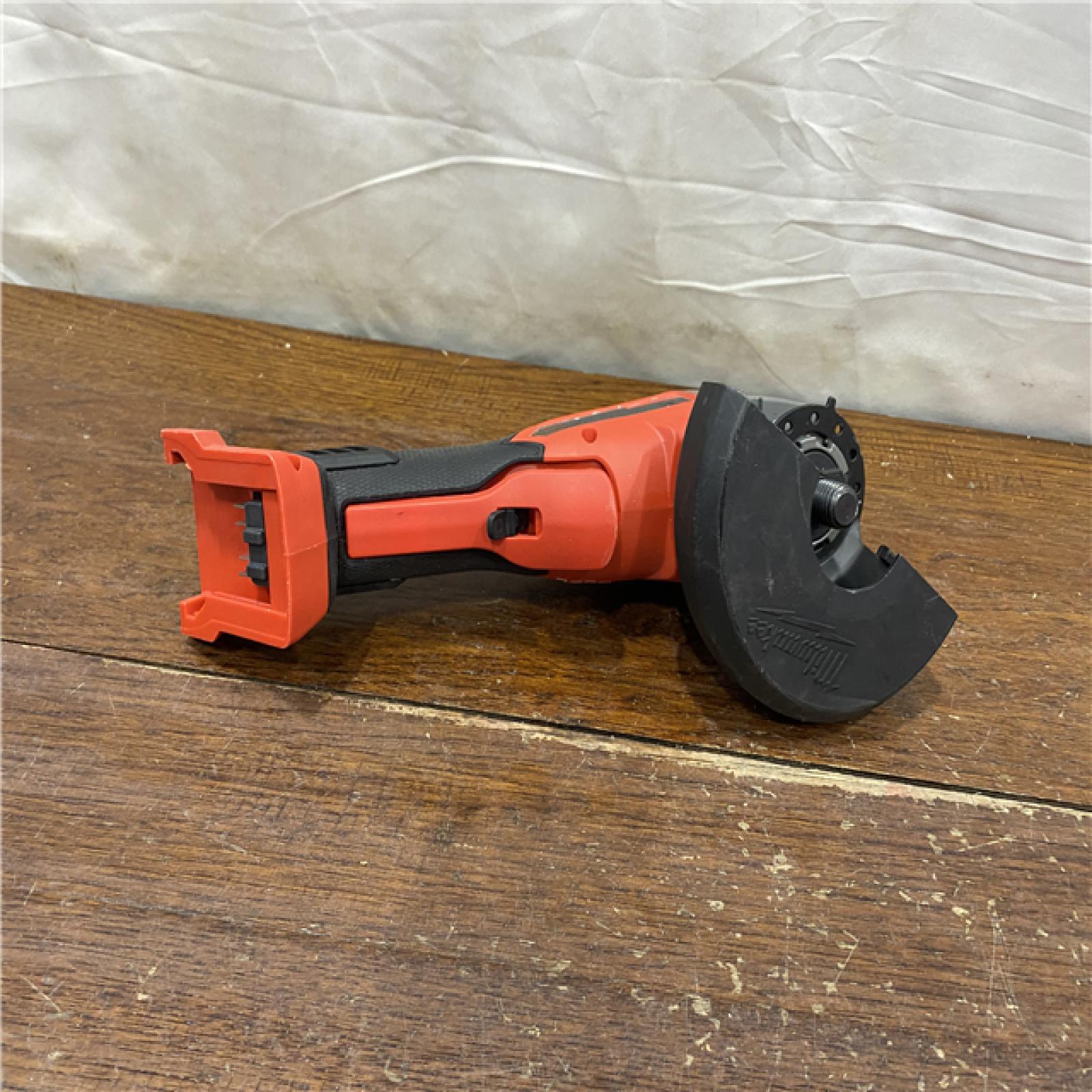 AS-IS Milwaukee 2880-20 M18 FUEL 18-Volt Lithium-Ion Brushless Cordless 4-1/2 in./5 in. Grinder W/Paddle Switch (Tool-Only)