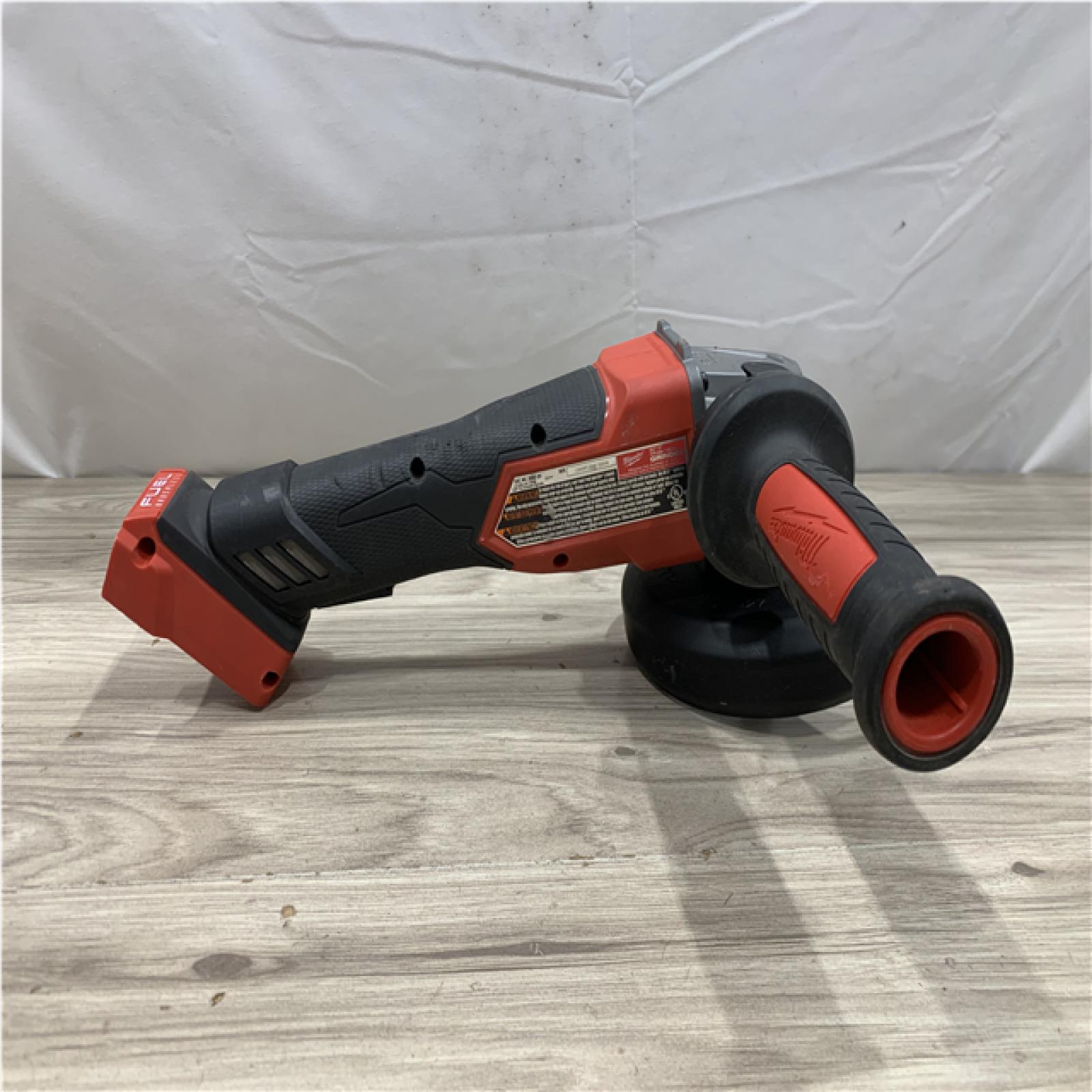 AS-IS Milwaukee FUEL 18V Lithium-Ion Brushless Cordless 4-1/2 in./5 in. Grinder w/Paddle Switch (Tool-Only)