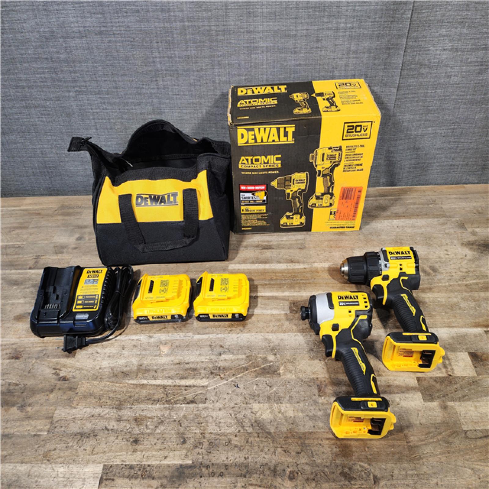 HOUSTON LOCATION - AS-IS (APPEARS LIKE NEW) Dewalt DCK225D2 20V MAX ATOMIC Brushless Compact Lithium-Ion 1/2 in. Cordless Drill Driver and 1/4 in. Impact Driver Combo Kit with 2 Batteries 2 Ah