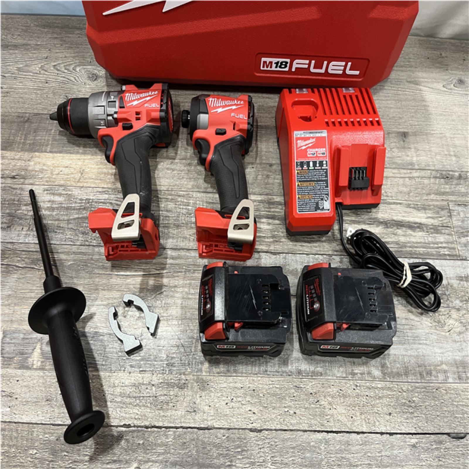 AS-IS Milwaukee FUEL 18V Lithium-Ion Brushless Cordless Hammer Drill and Impact Driver Combo Kit