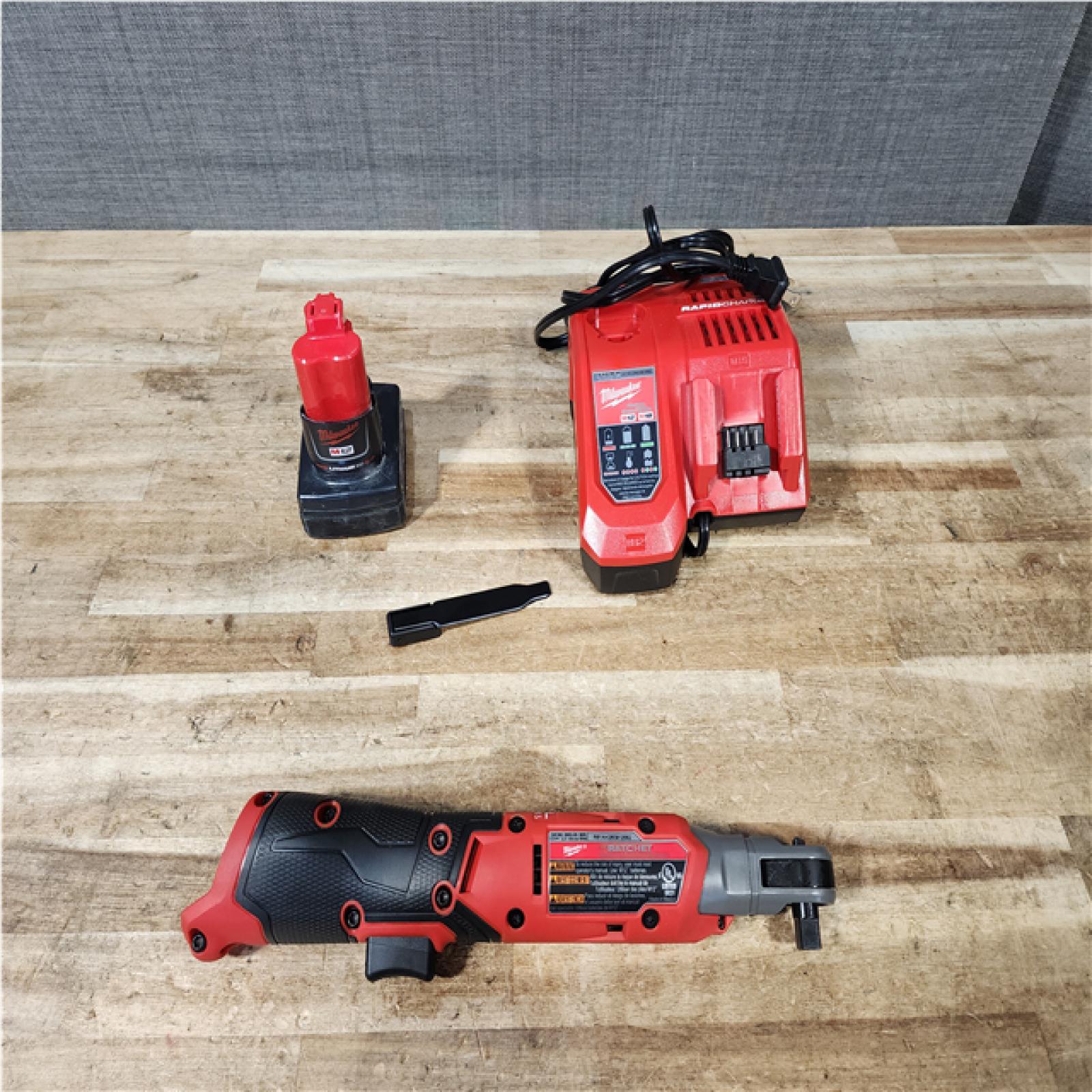 Houston Location AS-IS Milwaukee Fuel Cordless Ratchet and Battery with Charger