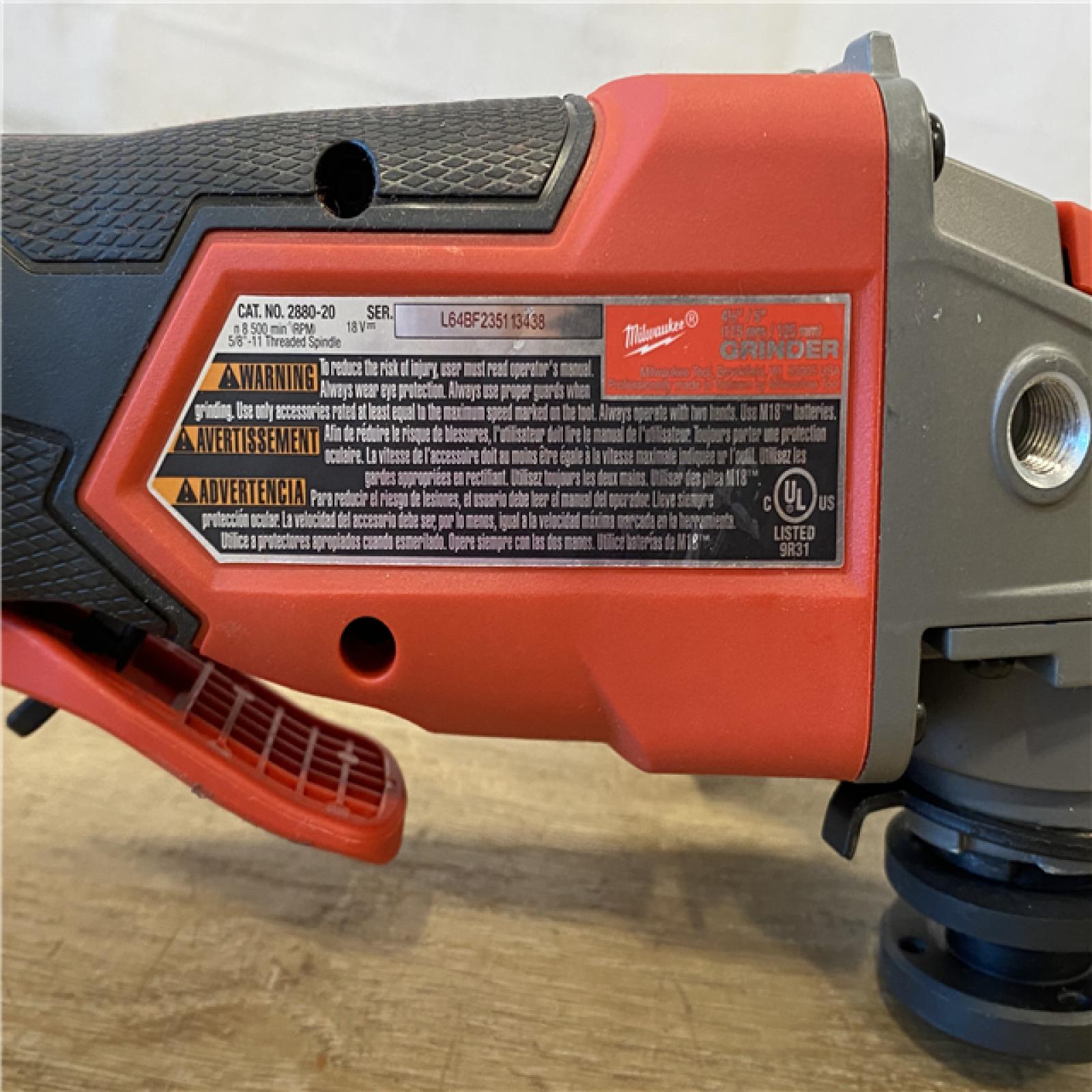 AS-IS Milwaukee FUEL 18V Lithium-Ion Brushless Cordless 4-1/2 in./5 in. Grinder w/Paddle Switch (Tool-Only)