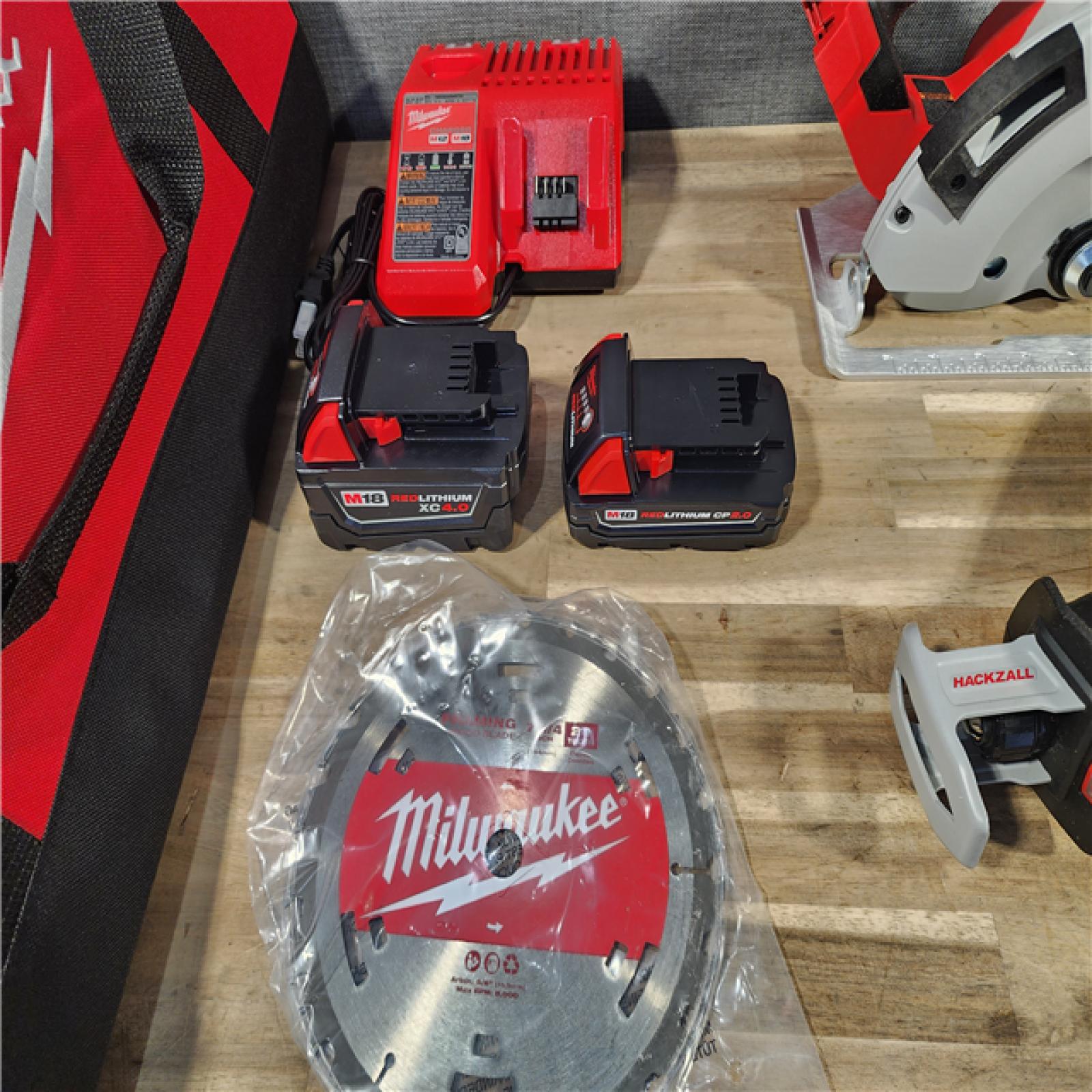 HOUSTON LOCATION - AS-IS (APPEARS LIKE NEW) Milwaukee M18 18-Volt Lithium-Ion Brushless Cordless Combo Kit (4-Tool) with 2-Batteries, 1-Charger and Tool Bag