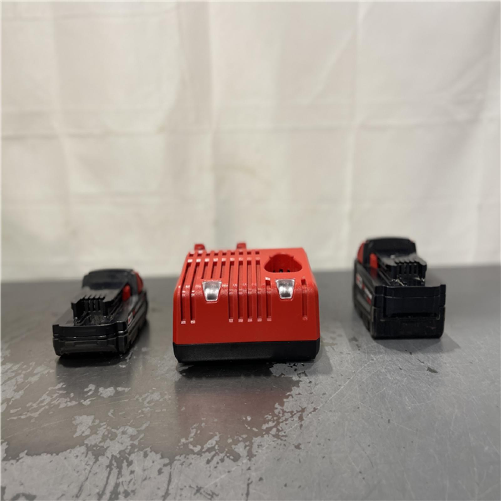 AS-IS- Milwaukee M18 18-Volt Lithium-Ion Starter Kit with One 5.0 Ah and One 2.0 Ah Battery and Charger