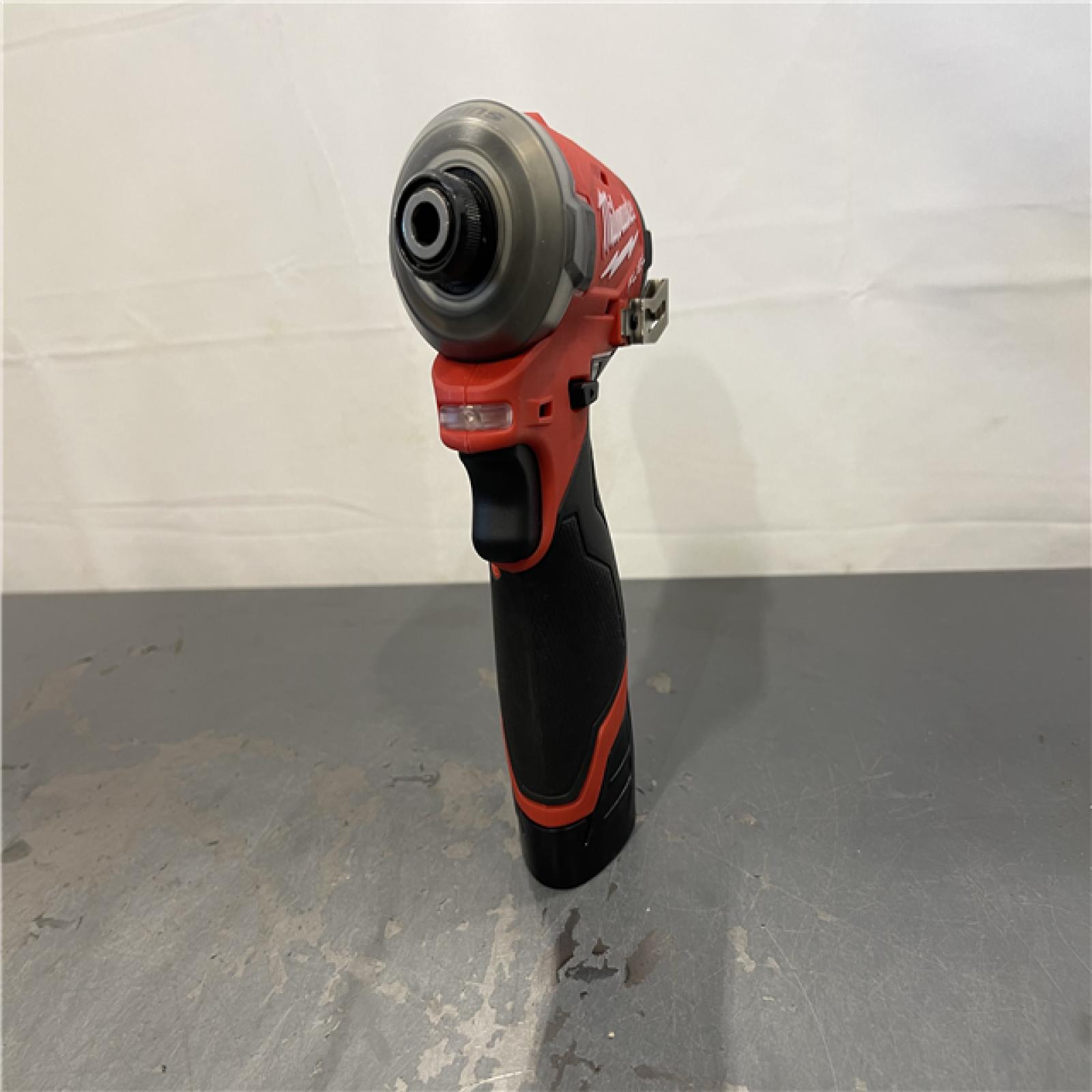 AS-IS - Milwaukee M12 FUEL SURGE 12V Lithium-Ion Brushless Cordless 1/4 in. Hex Impact Driver Compact Kit