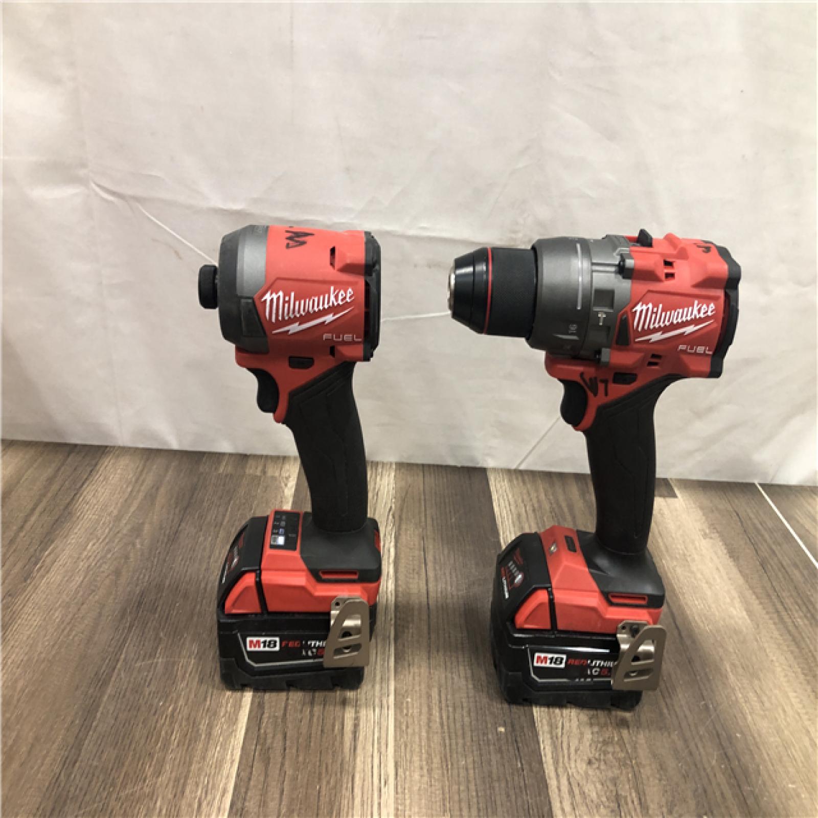 AS-IS Milwaukee FUEL 18V Lithium-Ion Brushless Cordless Hammer Drill and Impact Driver Combo Kit