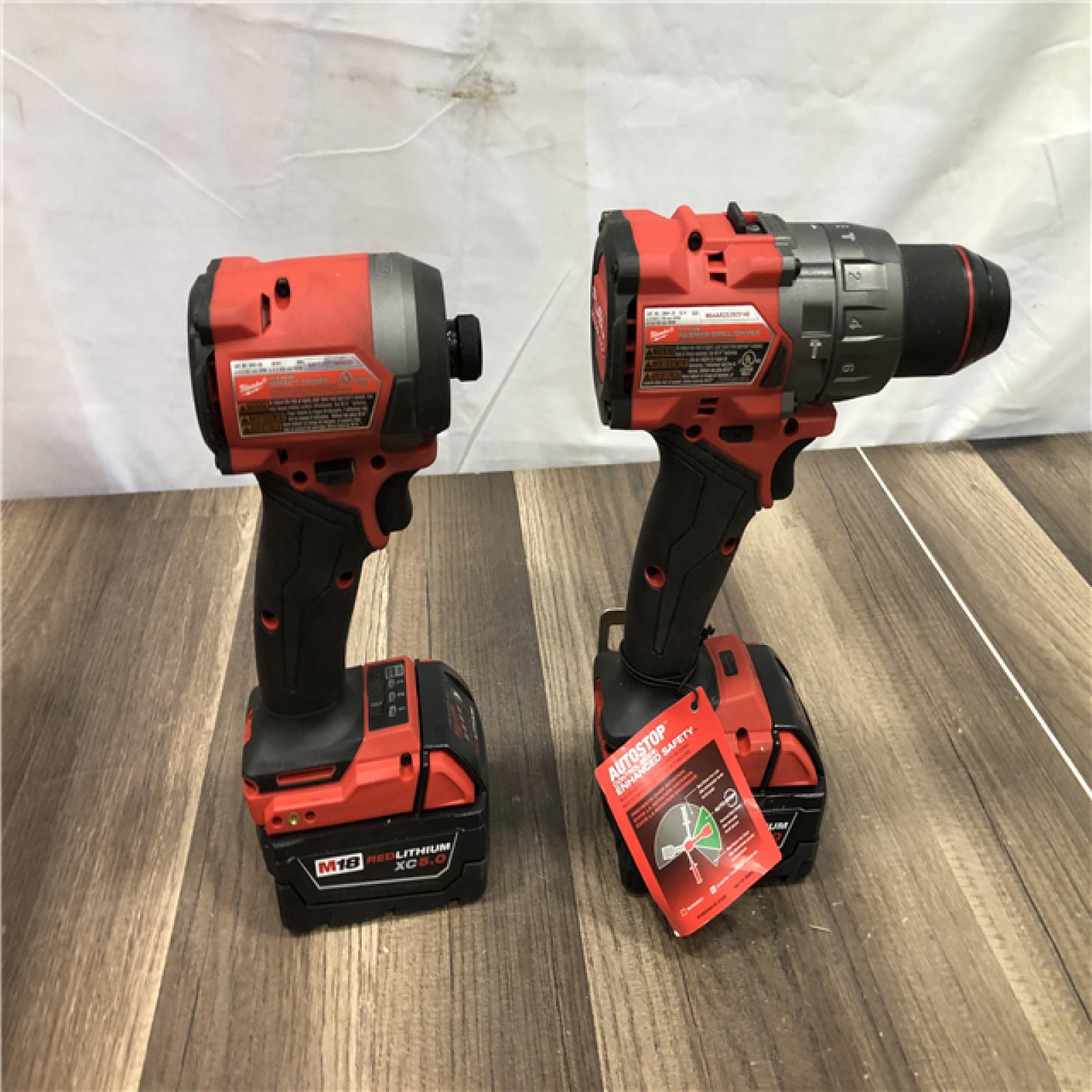 AS-IS Milwaukee FUEL 18V Lithium-Ion Brushless Cordless Hammer Drill and Impact Driver Combo Kit