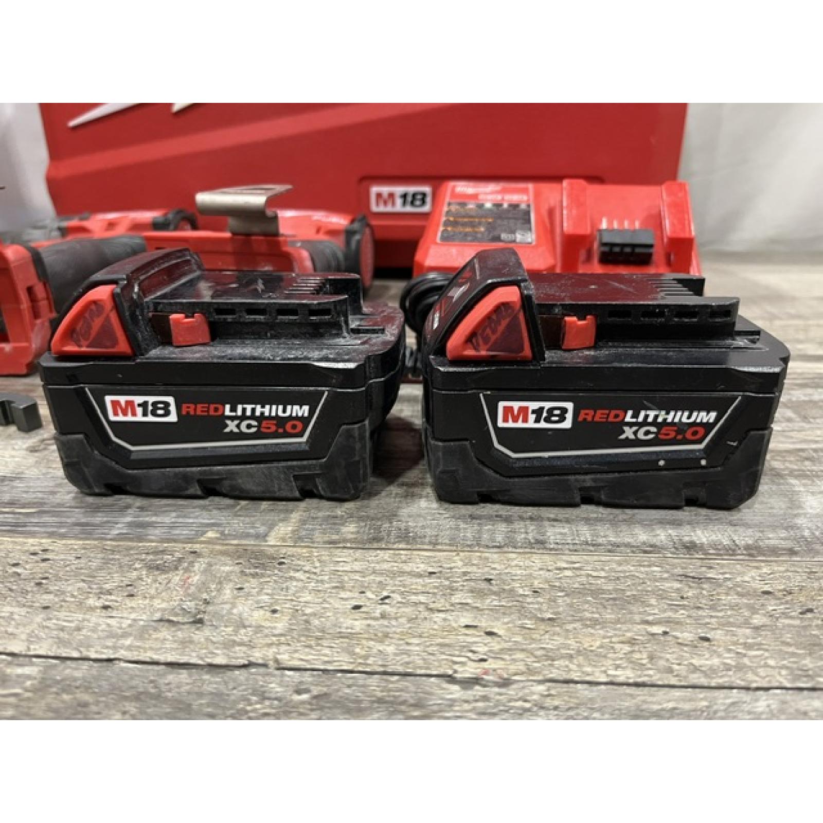 AS-IS Milwaukee FUEL 18V Lithium-Ion Brushless Cordless Hammer Drill and Impact Driver Combo Kit