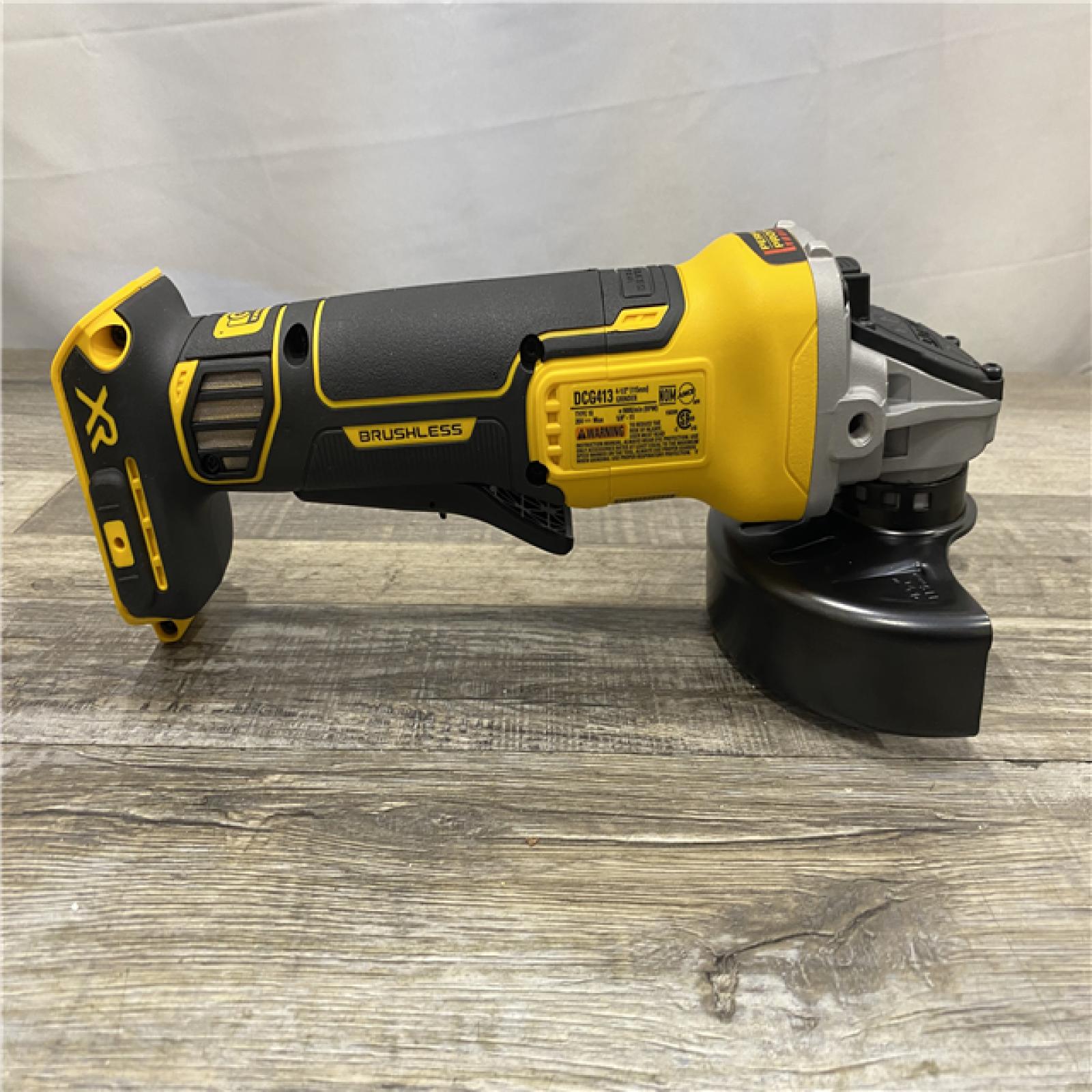 AS-IS DEWALT 20-Volt MAX XR Lithium-Ion Cordless Brushless 4-1/2 in. Paddle Switch Small Angle Grinder w/ Kickback Brake (Tool-Only)