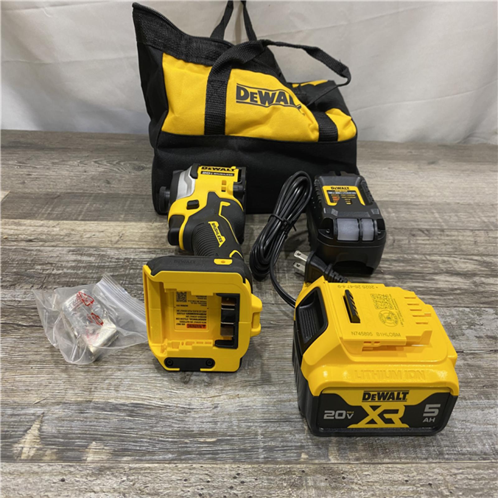 AS-IS DEWALT ATOMIC 20V MAX Lithium-Ion Cordless 1/4 in. Brushless Impact Driver Kit