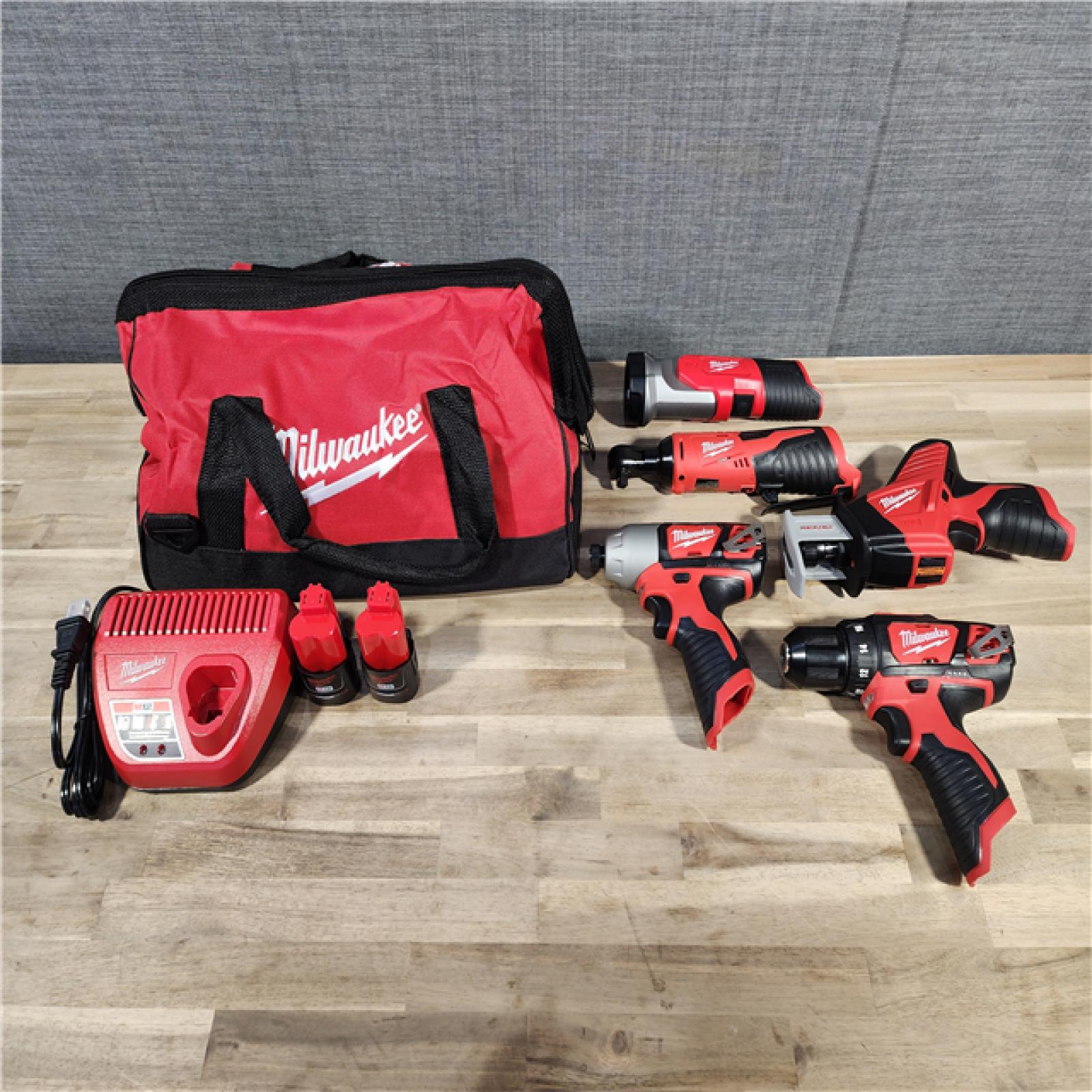 HOUSTON LOCATION - AS-IS MILWAUKEE M12 12V Lithium-Ion Cordless Combo Kit (5-Tool) with Two 1.5Ah Batteries, Charger & Tool Bag