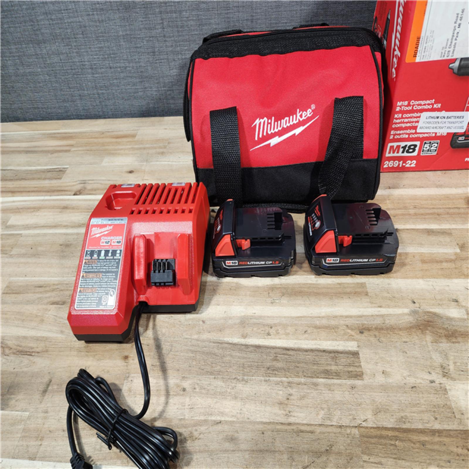 HOUSTON LOCATION - AS-IS Milwaukee 18V Lithium-Ion Cordless Drill Driver/Impact Driver Combo Kit