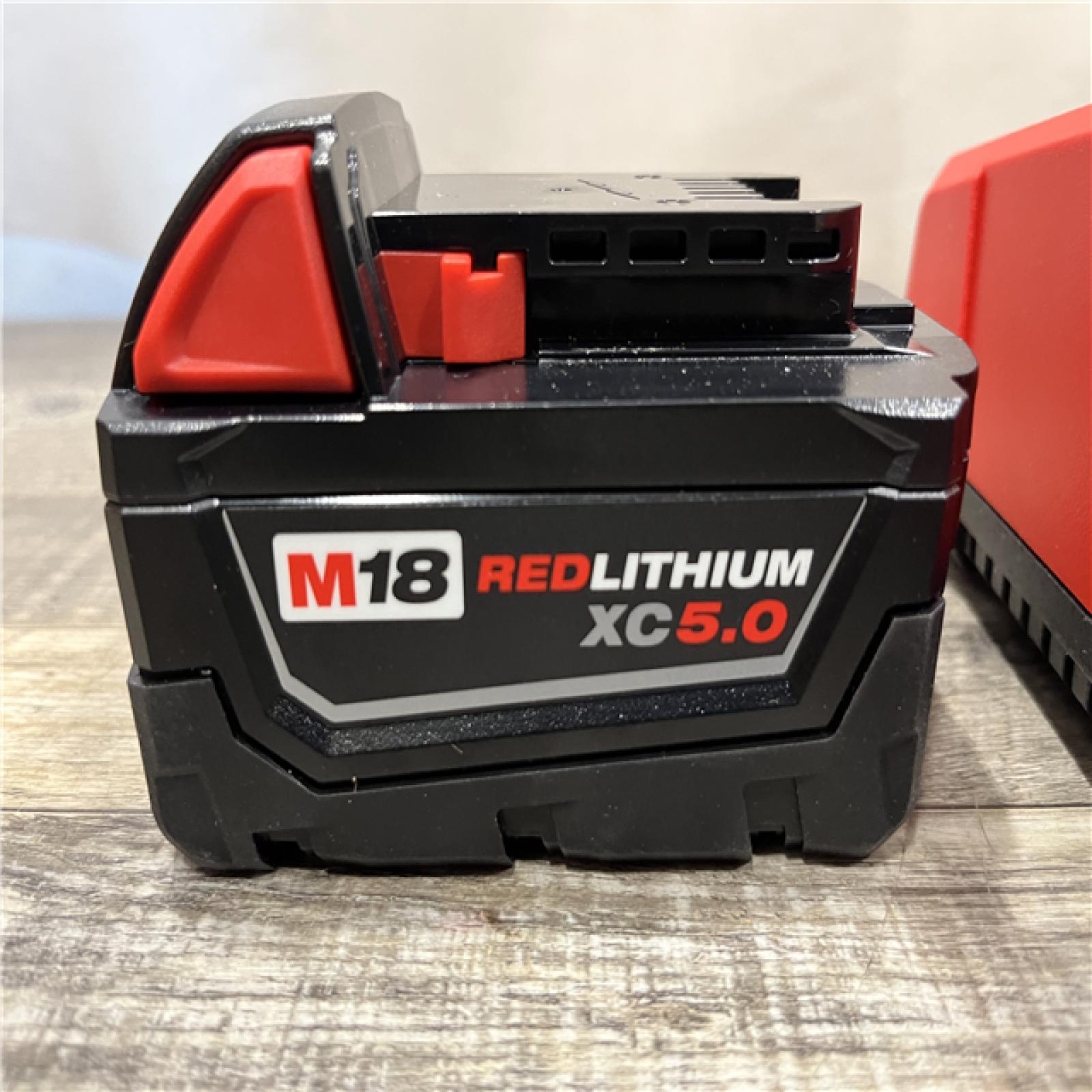 AS-IS Milwaukee 18-Volt Lithium-Ion XC Starter Kit with One 5.0Ah Battery and Charger