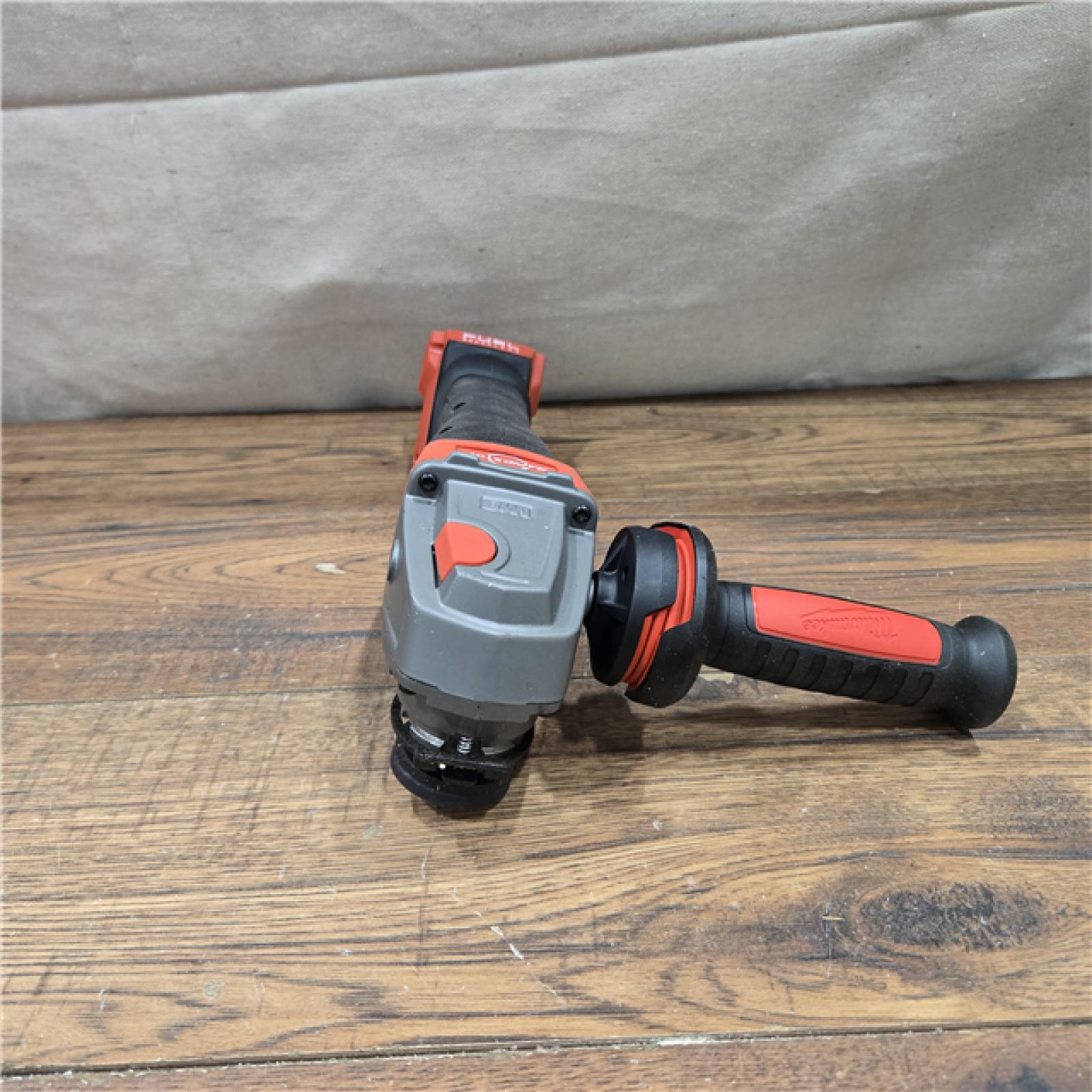 AS-IS Milwaukee 2880-20 M18 FUEL 18-Volt Lithium-Ion Brushless Cordless 4-1/2 in./5 in. Grinder W/Paddle Switch (Tool-Only)