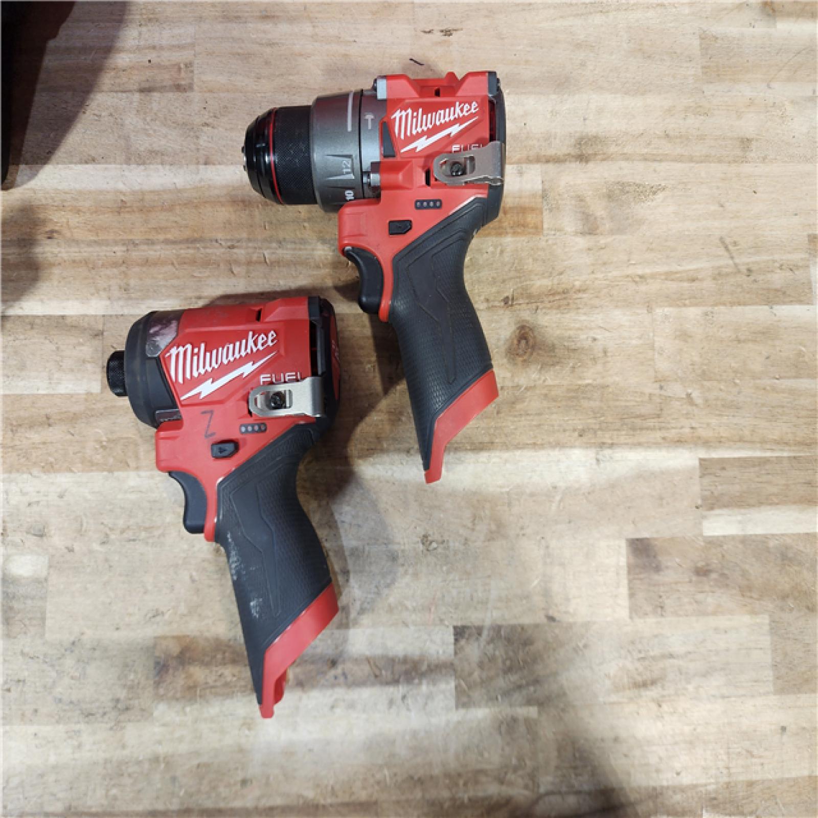 HOUSTON LOCATION - AS-IS Milwaukee FUEL 12-Volt Lithium-Ion Brushless Cordless Hammer Drill and Impact Driver Combo Kit