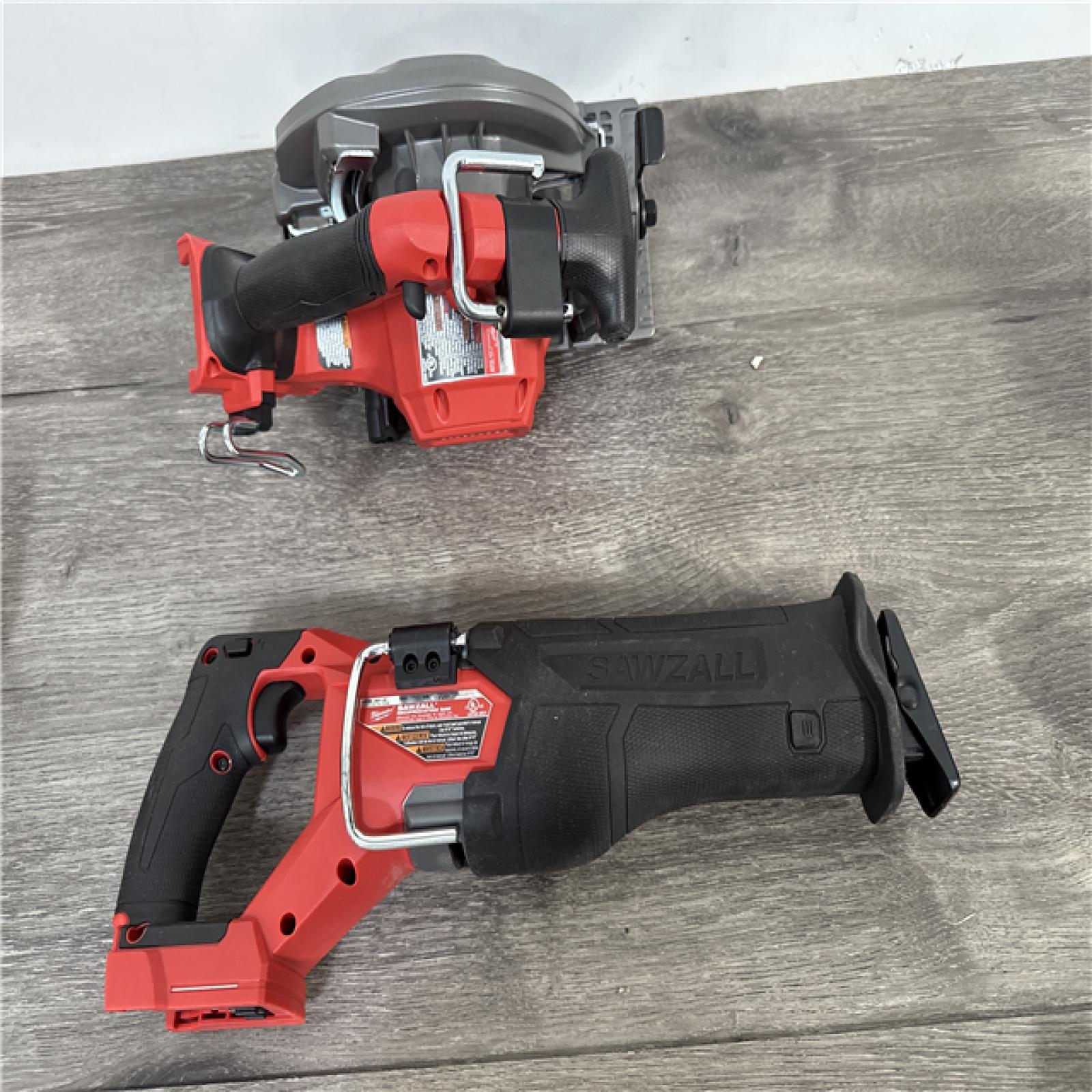 California As-IS 4-Piece Milwaukee Tool Combo Kit  Includes (2) Batteries  Charger and Bag; Appears in Excellent Condition