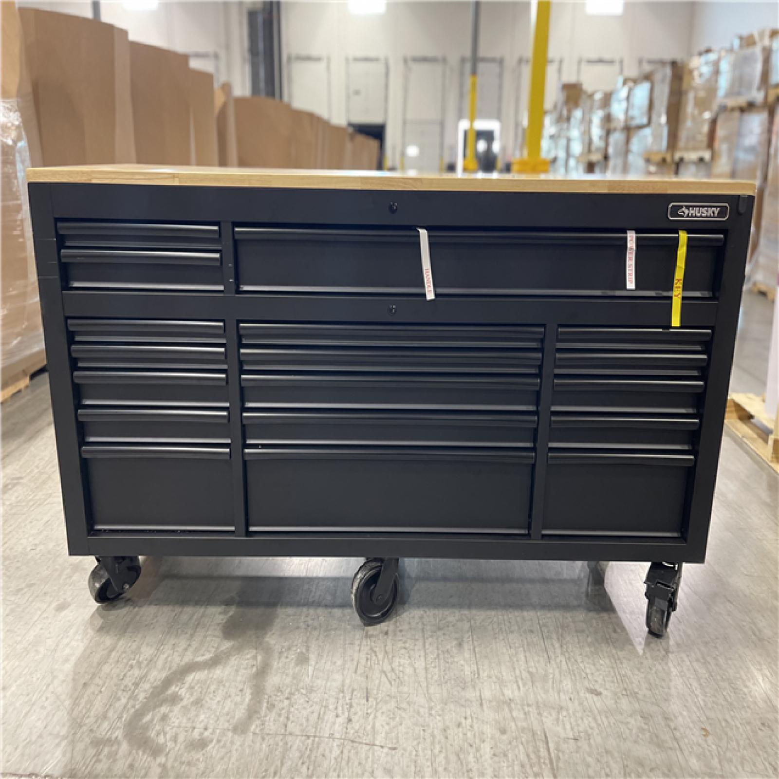 DALLAS LOCATION- AS-IS- HUSKY 72IN. 18 DRAWER MOBILE WORKBENCH WITH ADJUSTABLE HEIGHT TOP