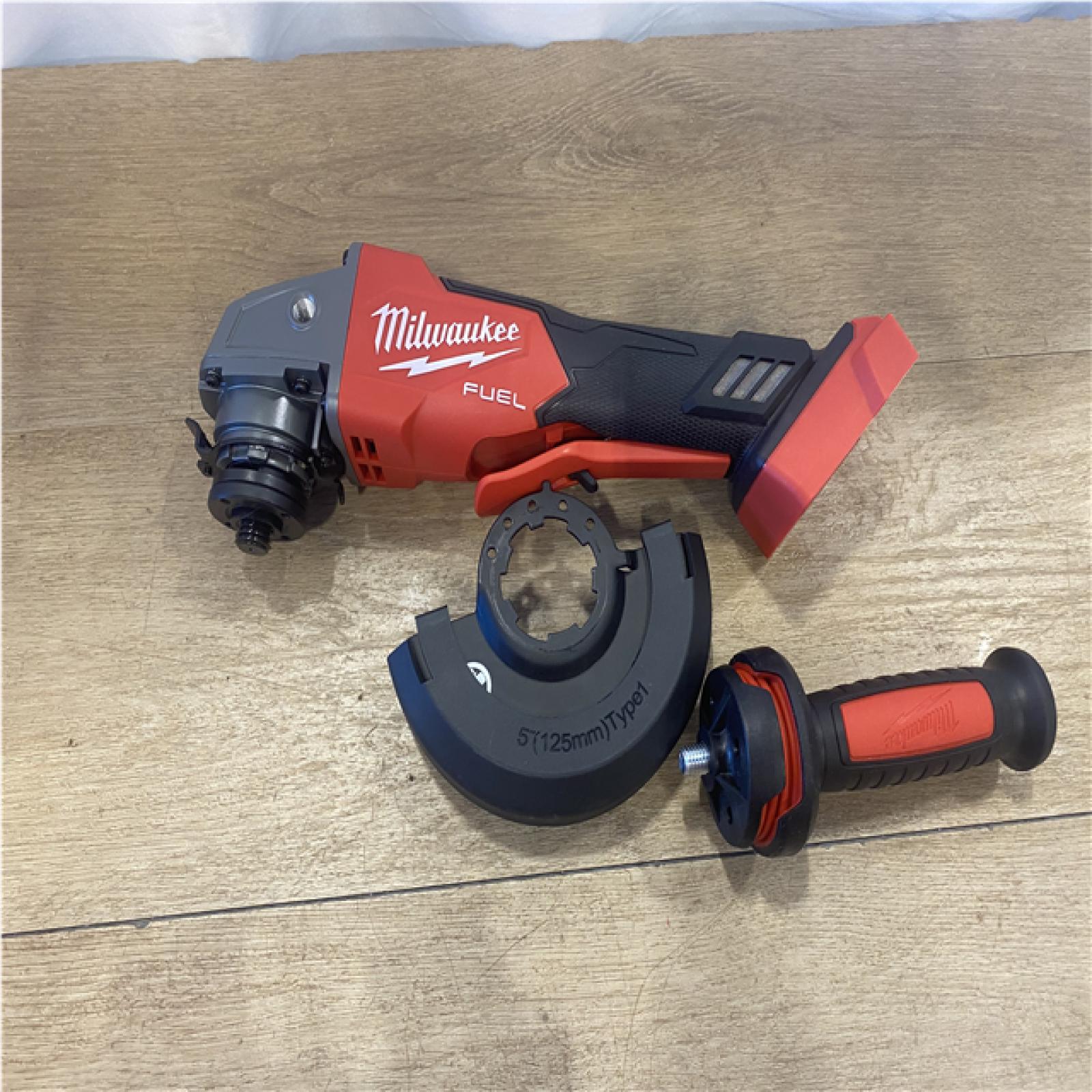 AS-IS Milwaukee FUEL 18V Lithium-Ion Brushless Cordless 4-1/2 in./5 in. Grinder w/Paddle Switch (Tool-Only)