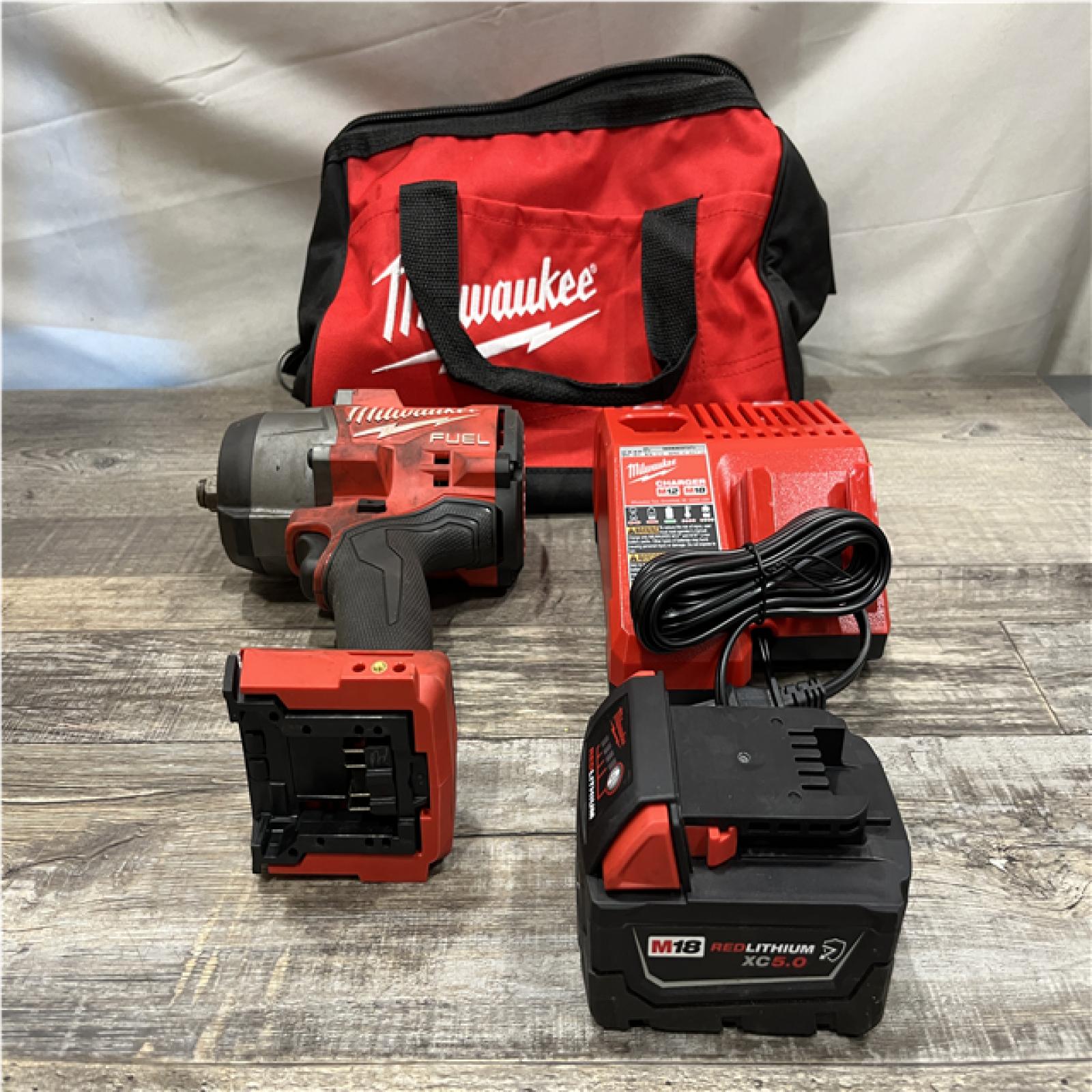 AS-IS Milwaukee FUEL 18V Lithium-Ion Brushless Cordless 1/2 in. Impact Wrench w/Friction Ring Kit