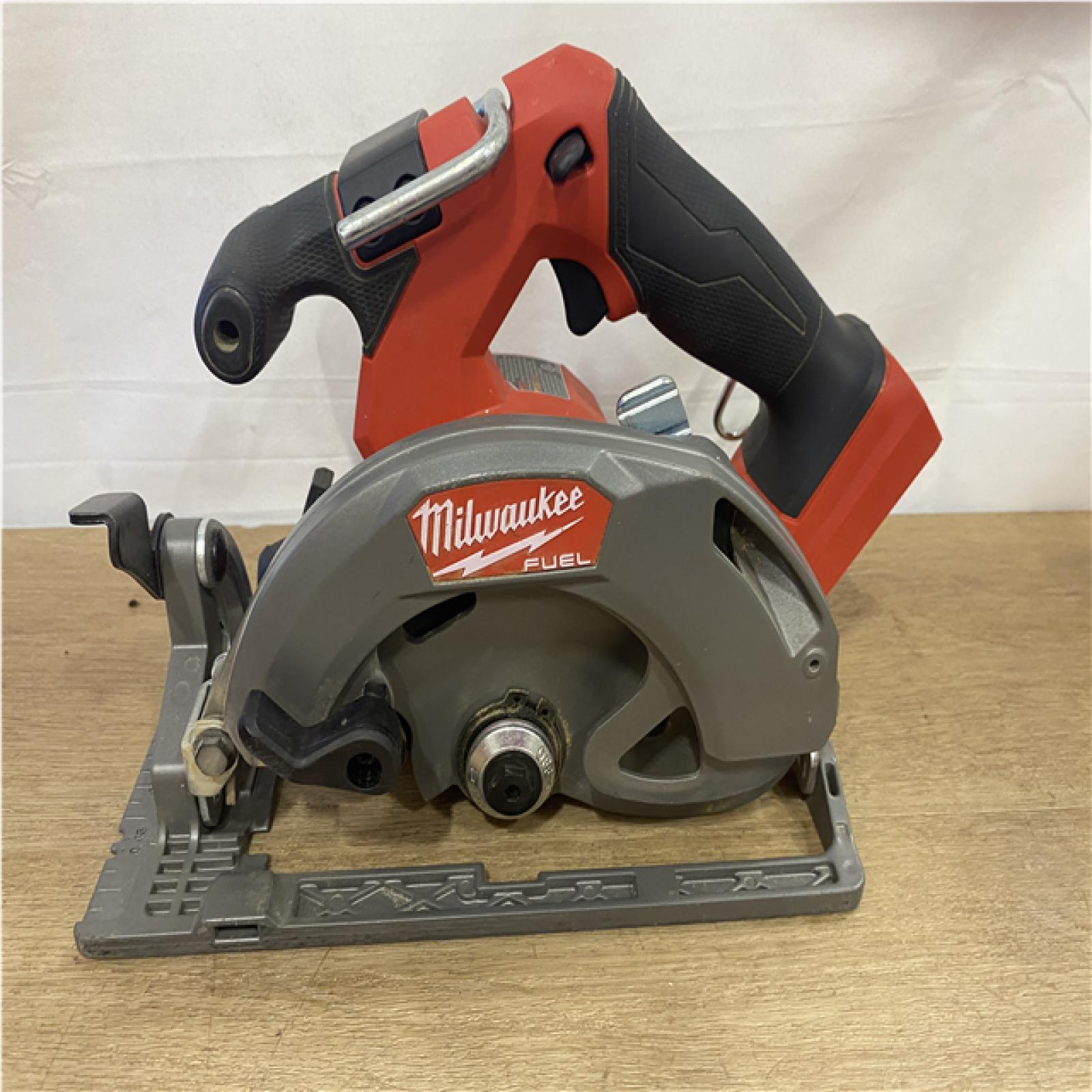 AS-IS Milwaukee FUEL 18V Lithium-Ion Brushless Cordless 6-1/2 in. Circular Saw (Tool-Only)
