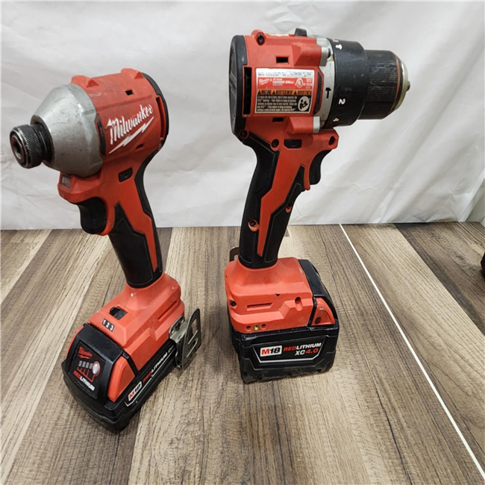 AS-IS Milwaukee M18 FUEL 18V Lithium-Ion Brushless Cordless Hammer Drill and Impact Driver Combo Kit (2-Tool) with 2 Batteries