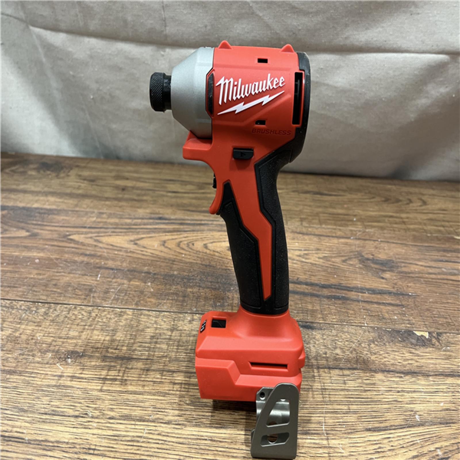 AS-IS Milwaukee M18 18-Volt Lithium-Ion Brushless Cordless Combo Kit (4-Tool) with 2-Batteries, 1-Charger and Tool Bag