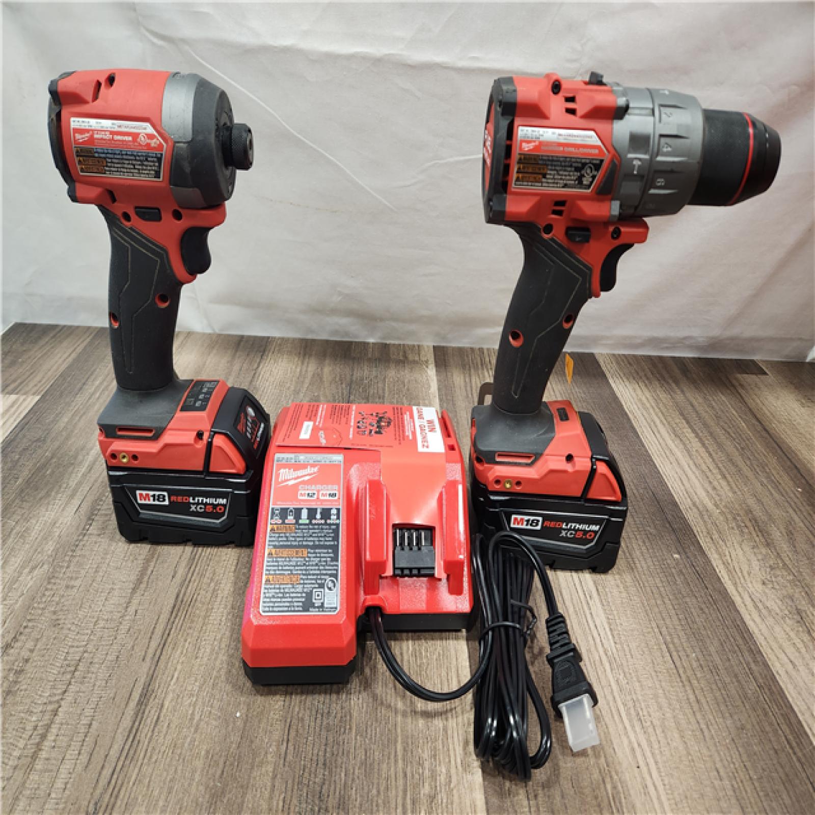 AS-IS- MILWAUKEE FUEL 18V Lithium-Ion Brushless Cordless Hammer Drill and Impact Driver Combo Kit