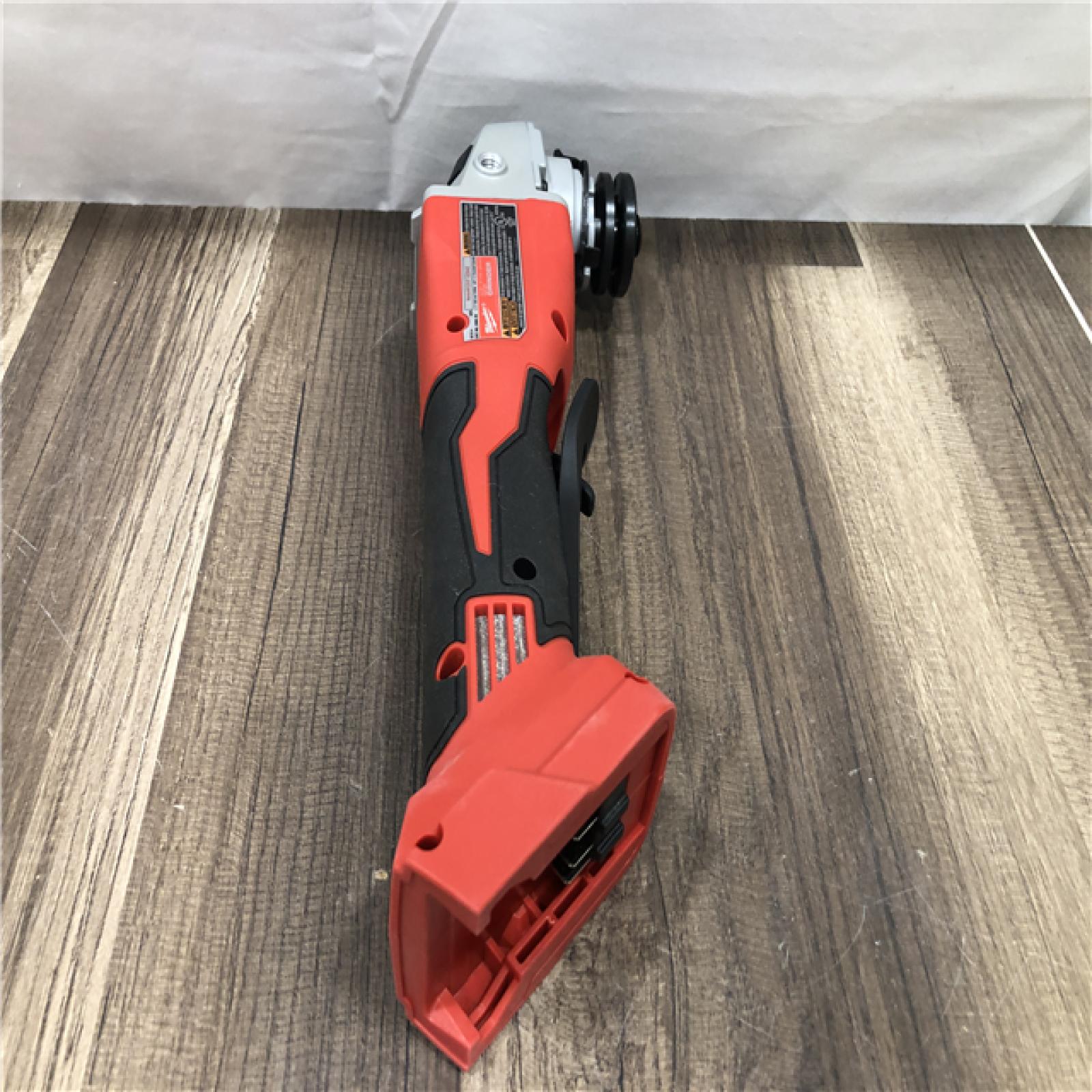 AS-IS Milwaukee 18V Lithium-Ion Brushless Cordless 4-1/2 in./5 in. Grinder w/Paddle Switch (Tool-Only)
