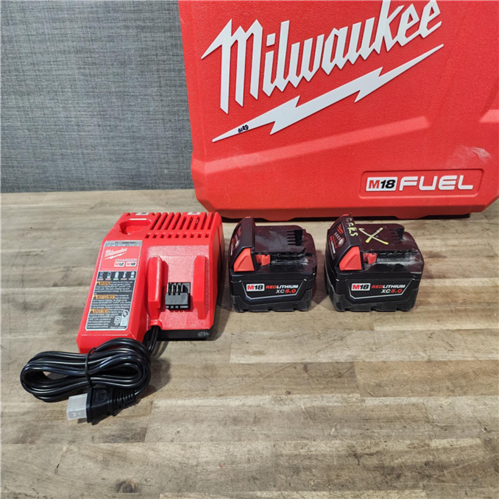HOUSTON LOCATION - AS-IS MILWAUKEE FUEL 18V Lithium-Ion Brushless Cordless Hammer Drill and Impact Driver Combo Kit