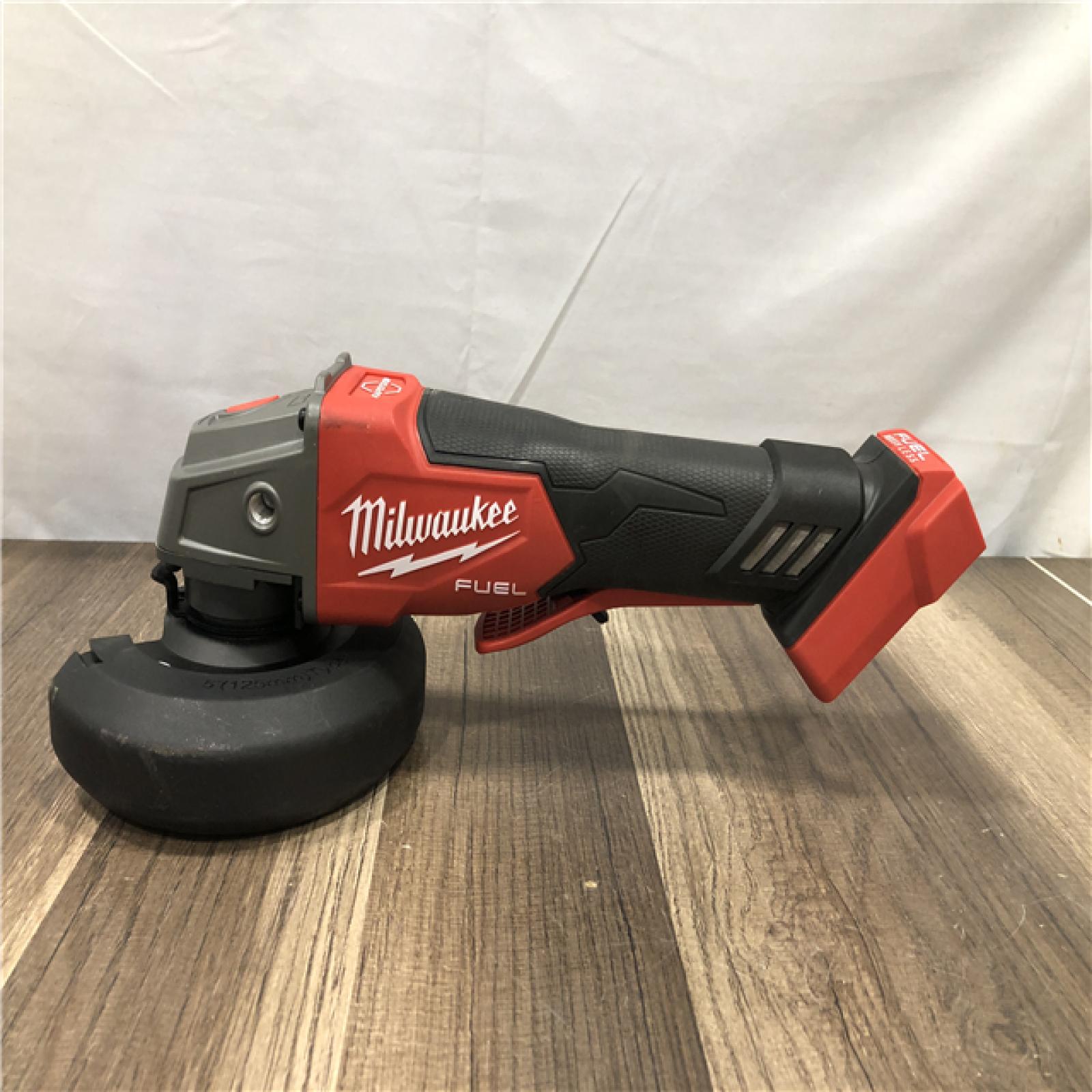 AS-IS Milwaukee FUEL 18V Lithium-Ion Brushless Cordless 4-1/2 in./5 in. Grinder w/Paddle Switch (Tool-Only)