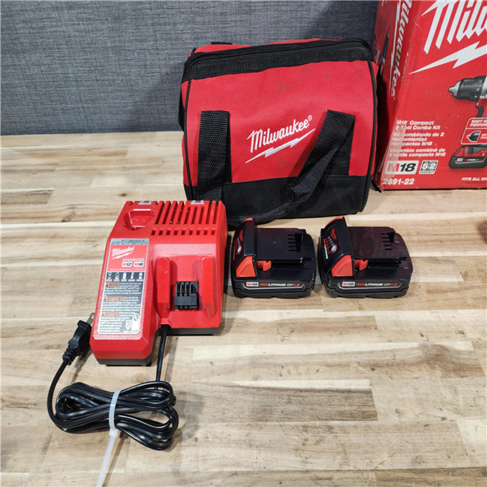 HOUSTON LOCATION - AS-IS Milwaukee 18V Lithium-Ion Cordless Drill Driver/Impact Driver Combo Kit
