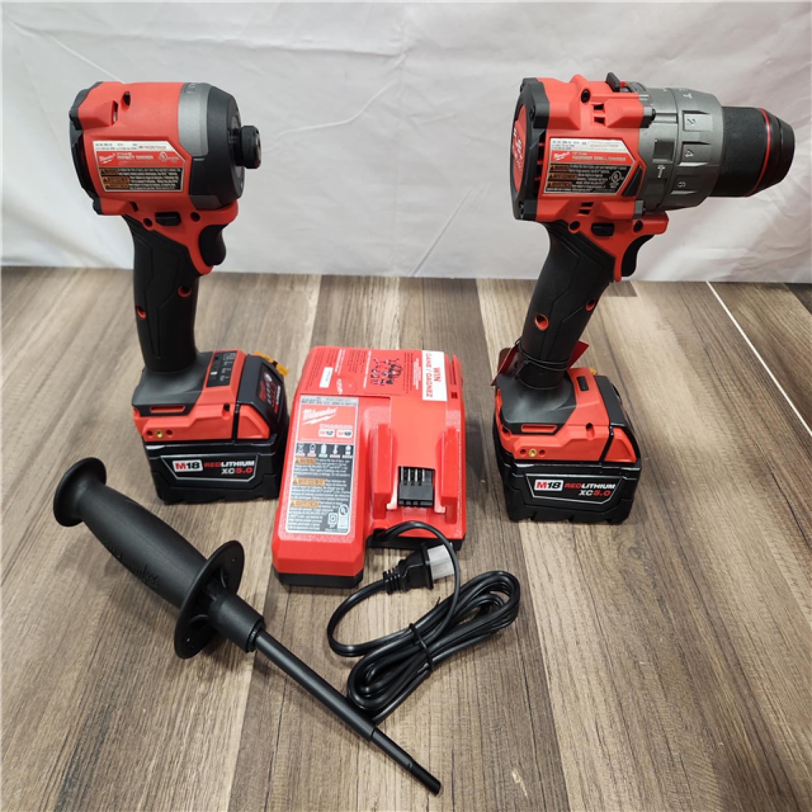 AS-IS- MILWAUKEE FUEL 18V Lithium-Ion Brushless Cordless Hammer Drill and Impact Driver Combo Kit
