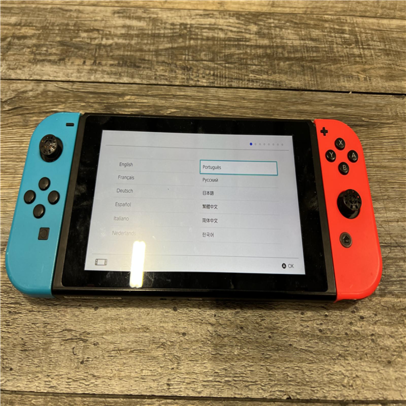 AS-IS Nintendo Switch with Neon Blue and Neon Red Joy-Con
