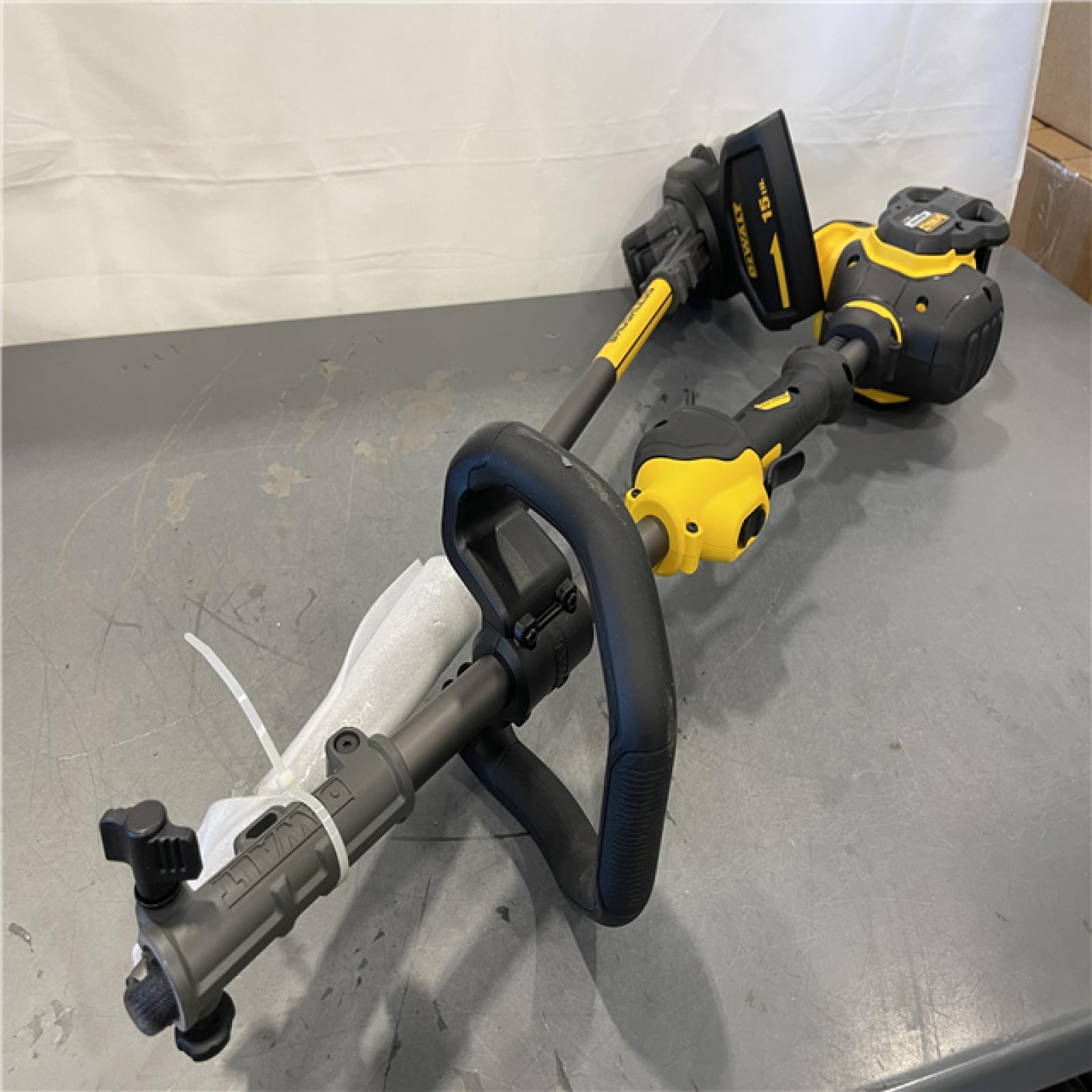 AS-IS -  DeWalt FLEXVOLT 60V MAX 15 in. Brushless Cordless Battery Powered String Trimmer Kit