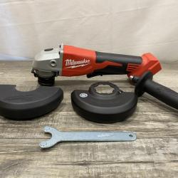 AS-IS Milwaukee 18V Lithium-Ion Brushless Cordless 4-1/2 in./5 in. Grinder w/Paddle Switch (Tool-Only)