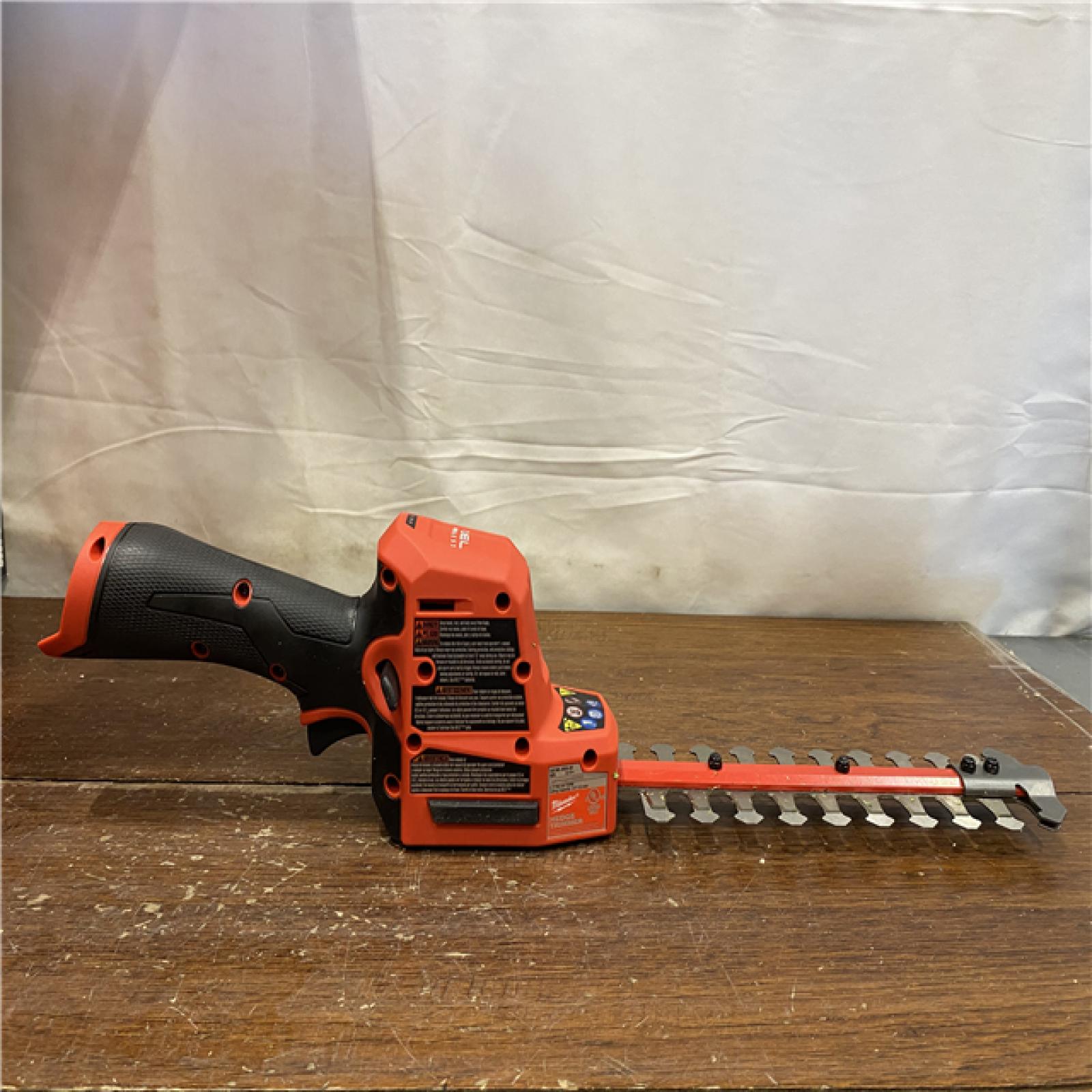 AS-IS Milwaukee M12 FUEL 8 in. 12V Lithium-Ion Brushless Cordless Battery Hedge Trimmer (Tool-Only)