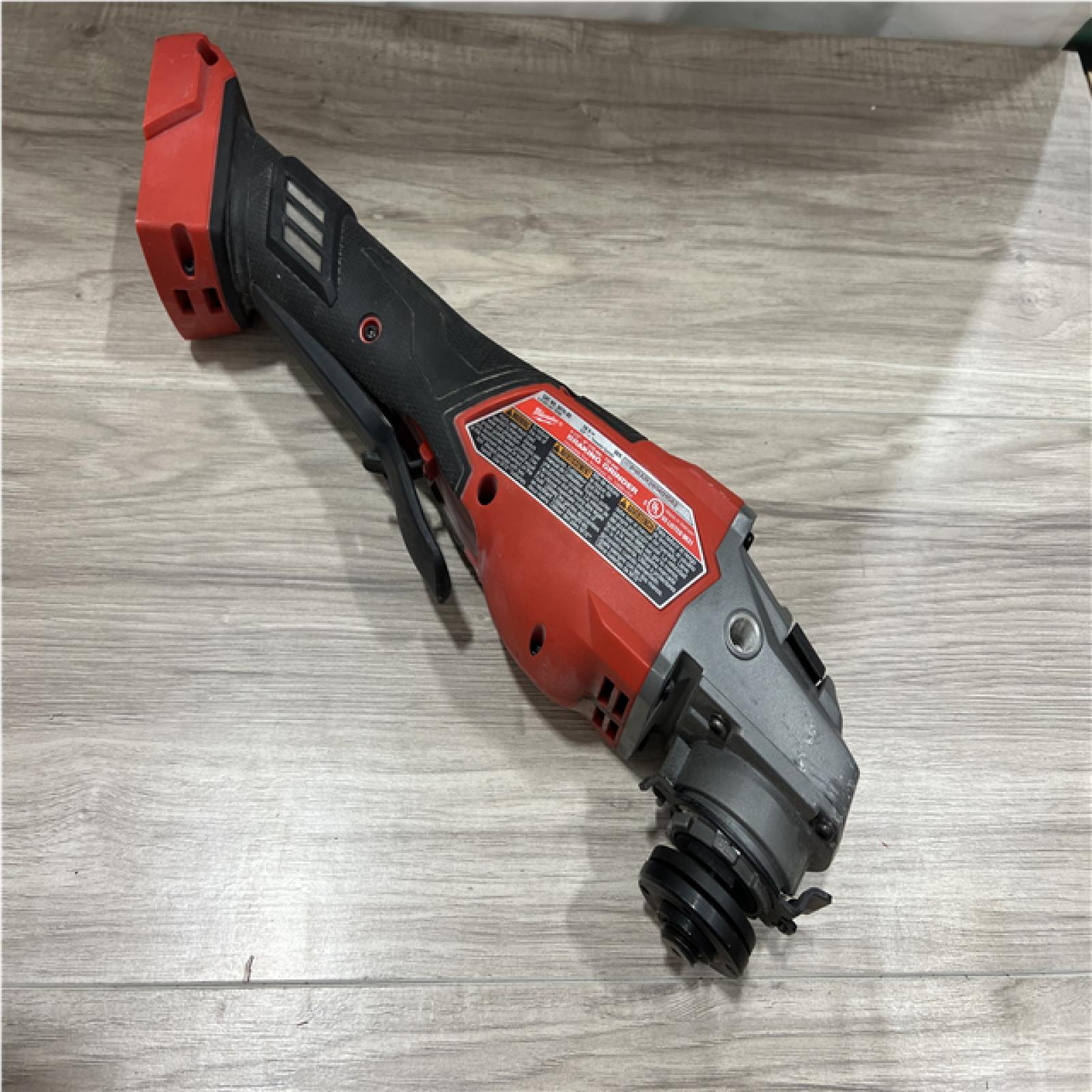 AS-IS Milwaukee FUEL 18-Volt Lithium-Ion Brushless Cordless 4-1/2 in./6 in. Braking Grinder with Paddle Switch (Tool-Only)