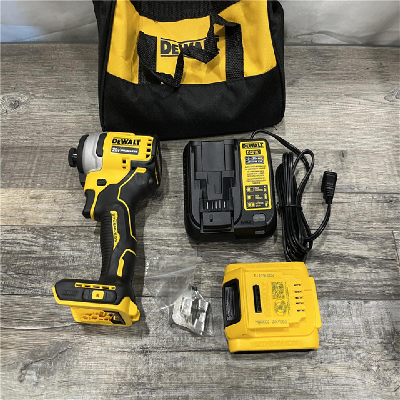 AS-IS DEWALT Atomic 20V Max Lithium-Ion Brushless Cordless Compact 1/4 in. Impact Driver Kit