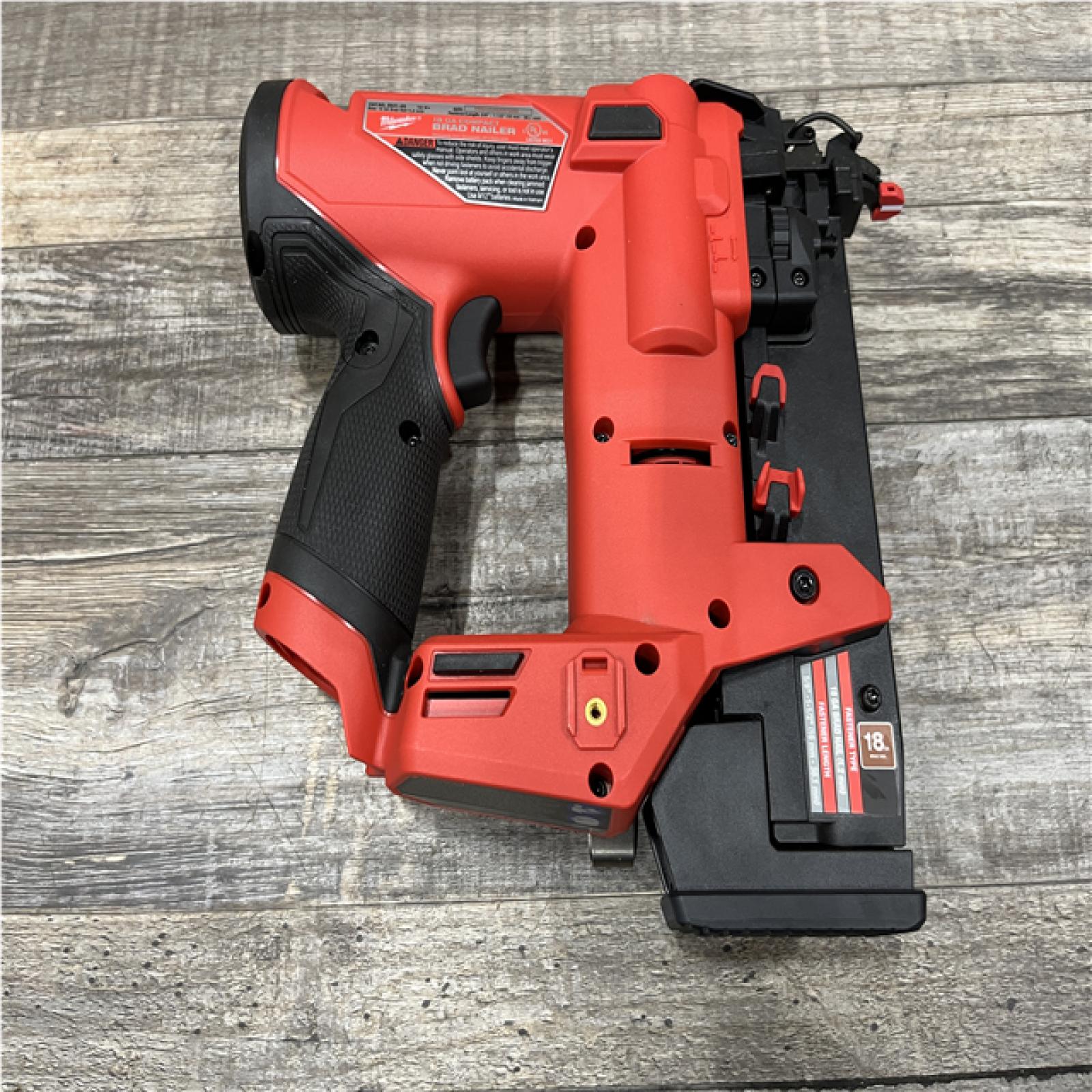 AS-IS Milwaukee FUEL 12-Volt Lithium-Ion Brushless Cordless 18-Gauge 1-1/2 in. Compact Brad Nailer (Tool Only)