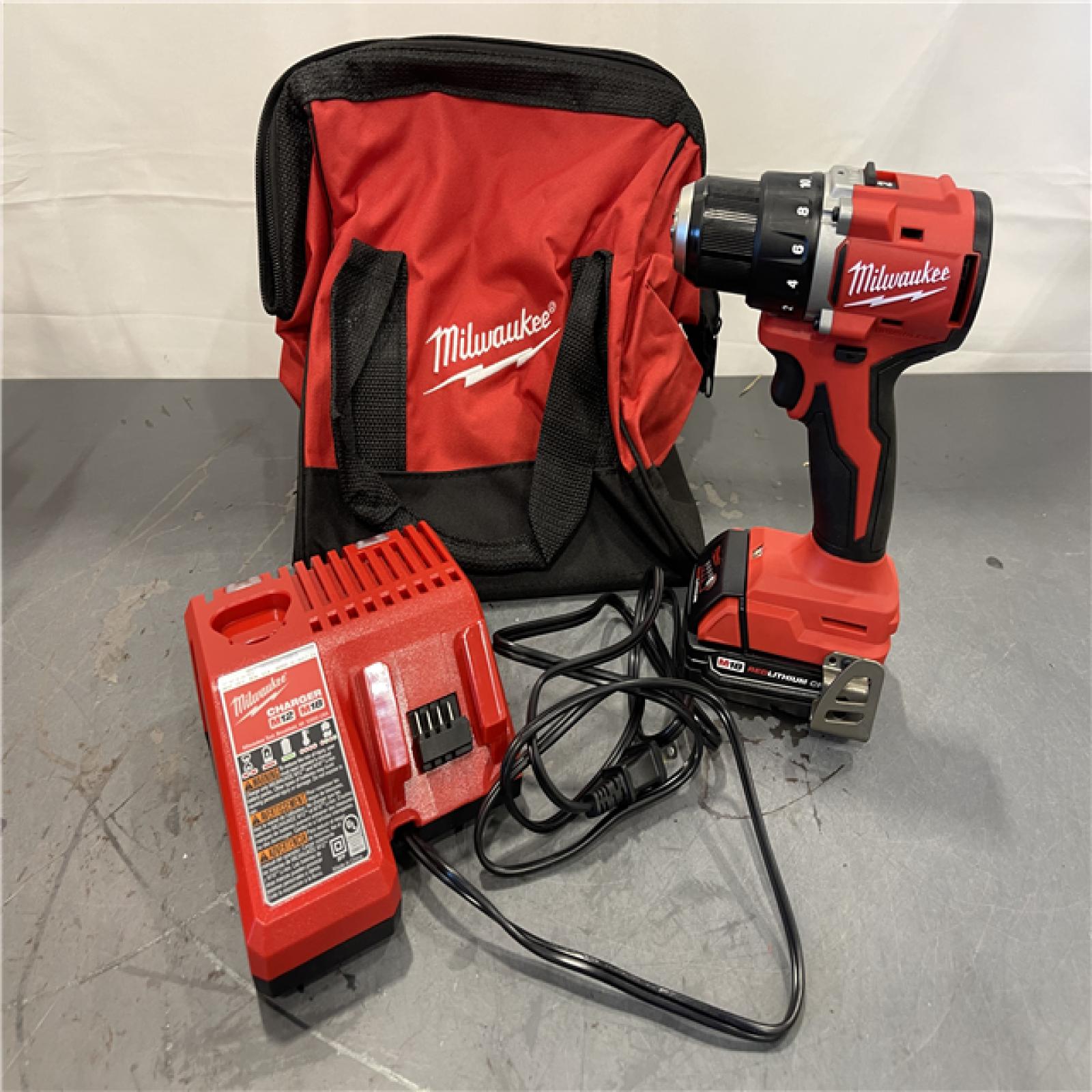 AS-IS - Milwaukee M18 18V Lithium-Ion Brushless Cordless 1/2 in. Compact Drill/Driver Kit