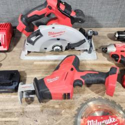 HOUSTON LOCATION - AS-IS Milwaukee M18 18-Volt Lithium-Ion Brushless Cordless Combo Kit (4-Tool) with 2-Batteries  1-Charger and Tool Bag