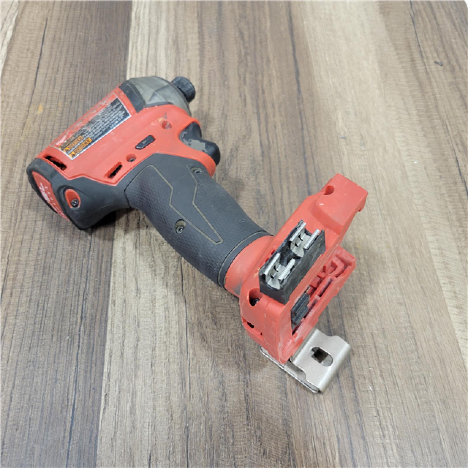 AS-IS Milwaukee 2953-20 18V Lithium-Ion Brushless Cordless 1/4   Hex Impact Driver Bare Tool  Red